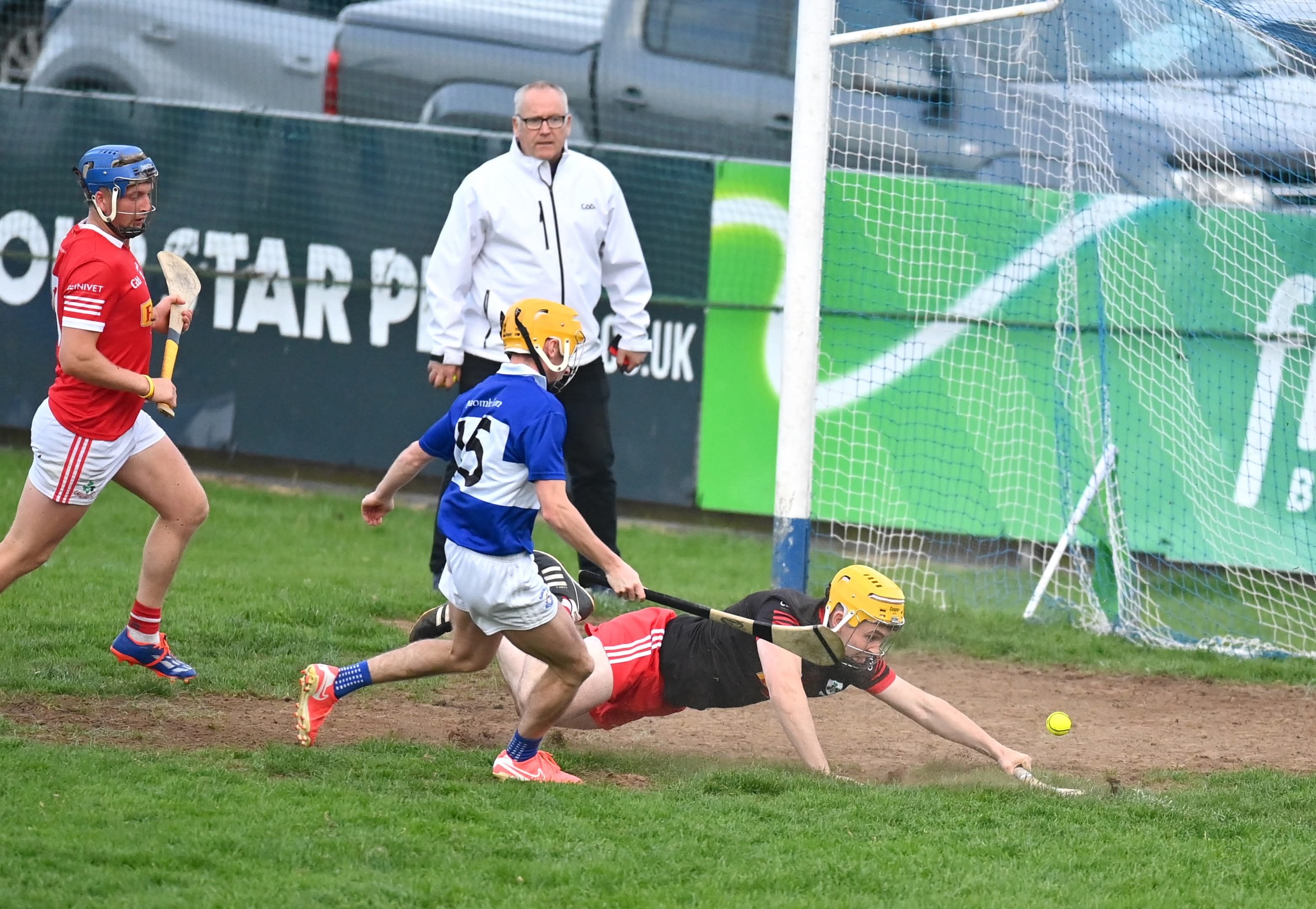 FINE MARGINS: Corrigan Park faithful left bewildered as Loughiel escape goal-mouth scramble