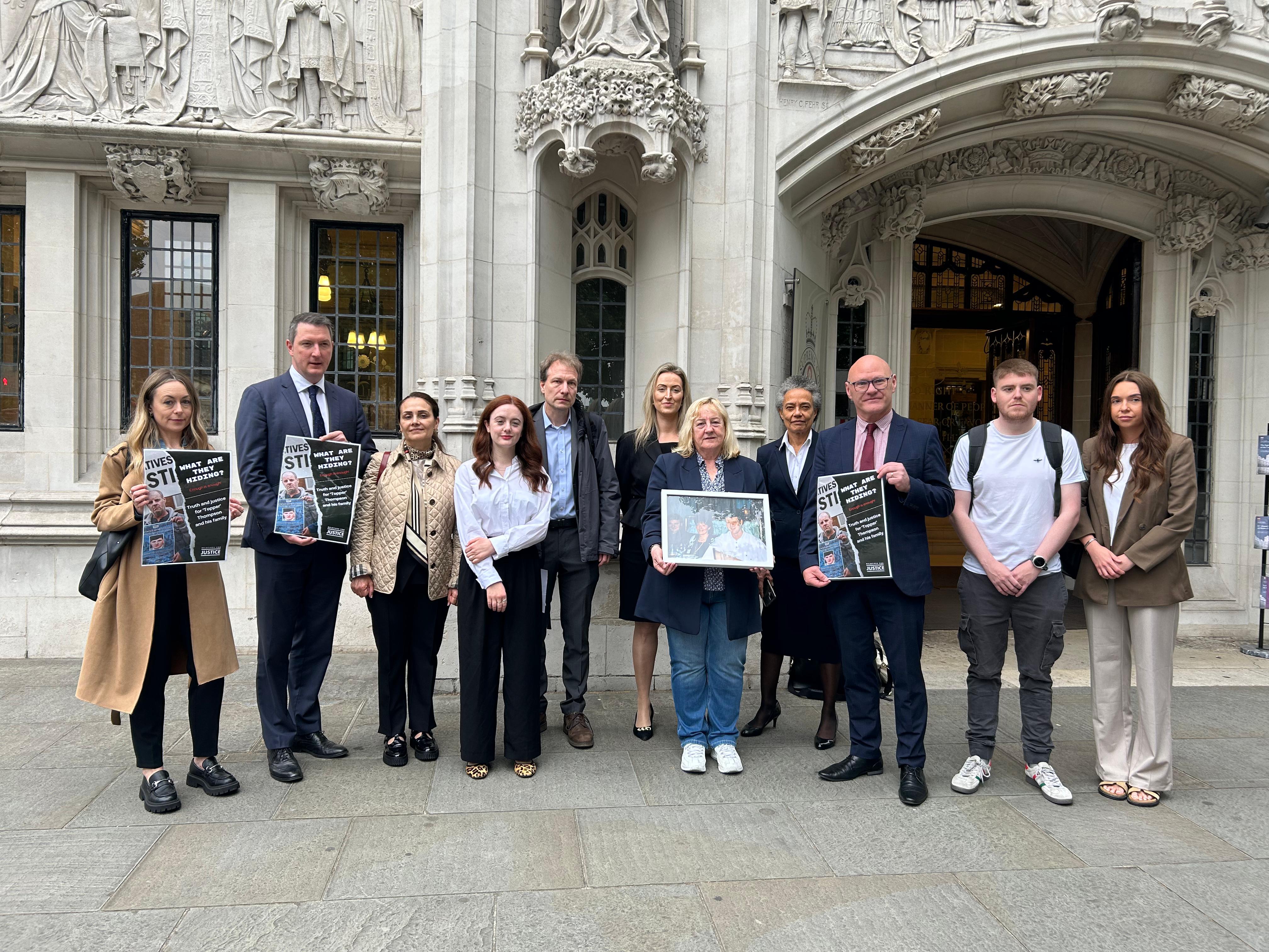 Briege is joined by supporters outside the Supreme Court this morning