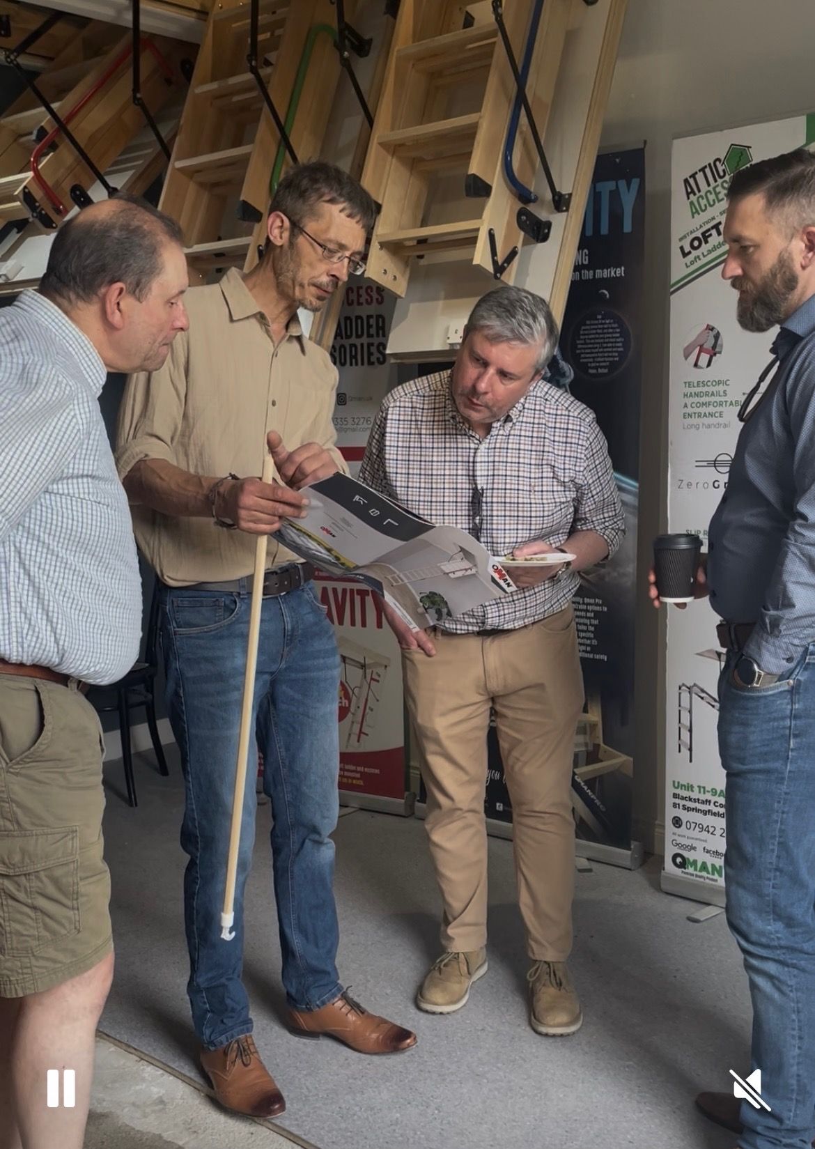 MOVING UP: Matt (second from left) chats to prospective customers at the open day