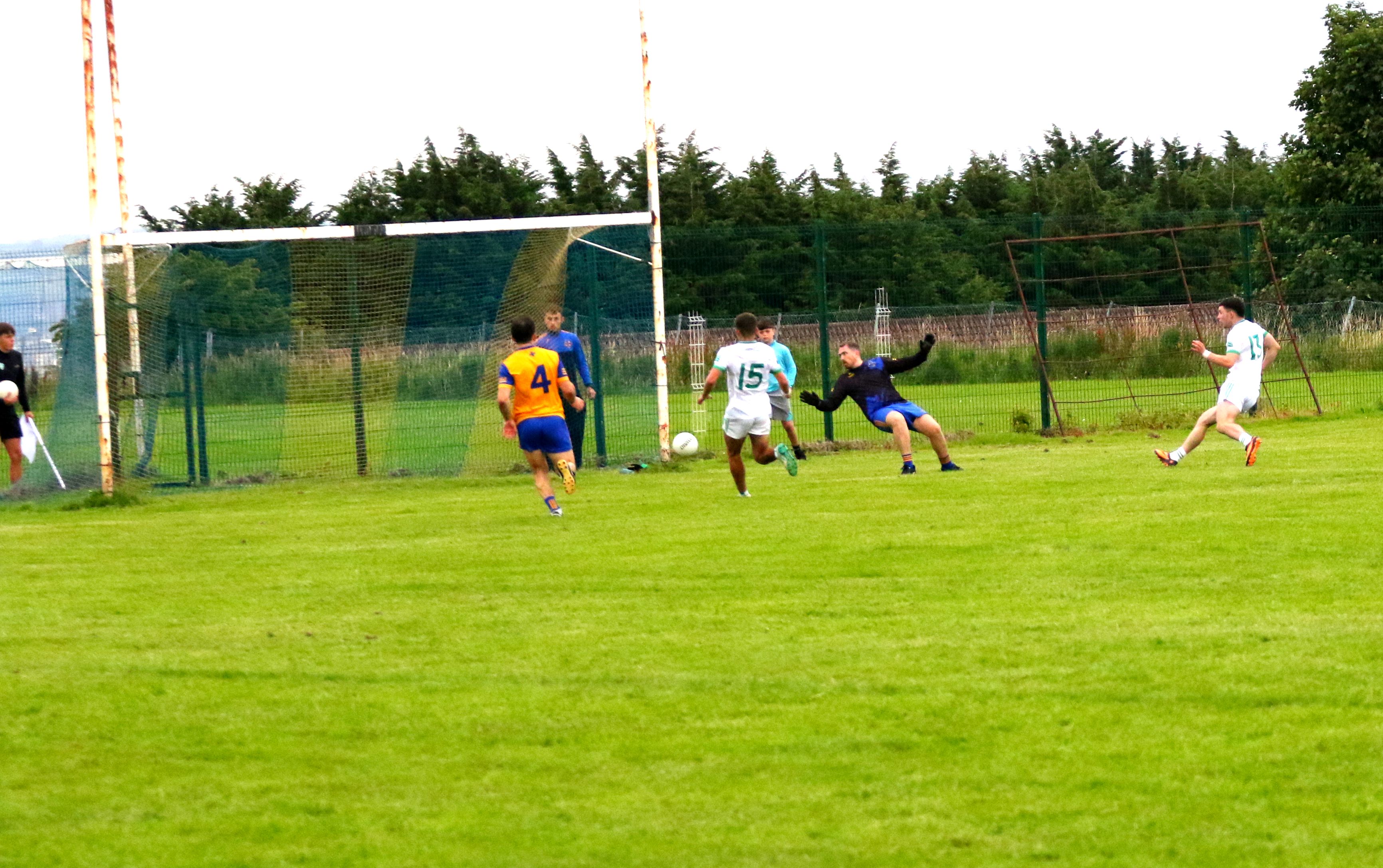 IN THE NET: Tom Patchett scores a goal to reduce the deficit