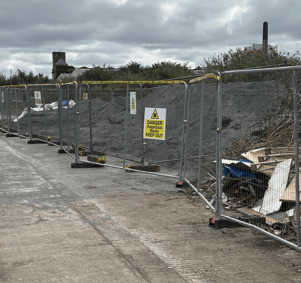 SAFE AS HOUSES: The large pile of asbestors was covered with plastic, then fine gravel