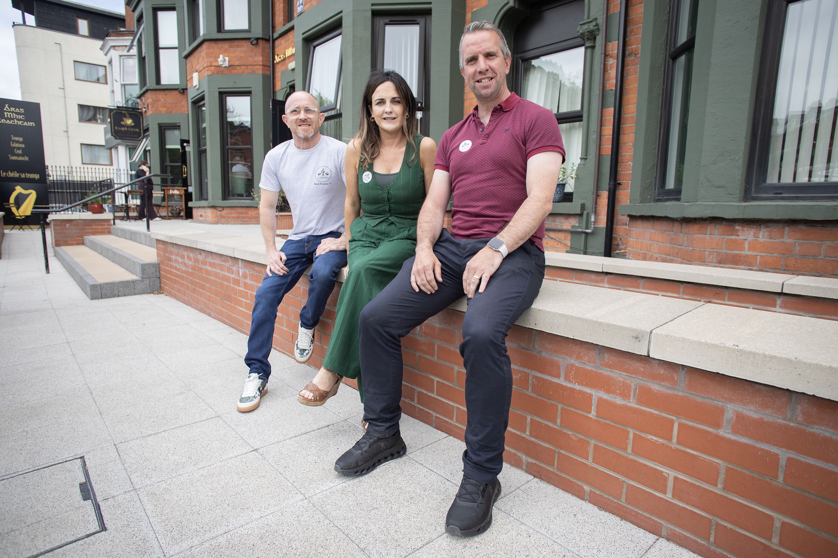 Críostóir Keenan with Aisling Uí Ghribín and Barra Ó Muirí from Gaelphobal Ard Mhacha Theas