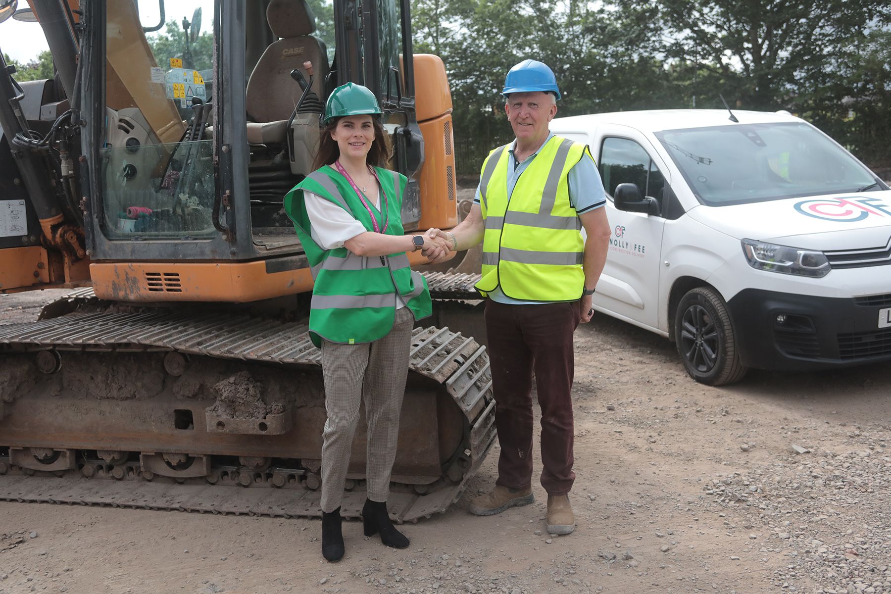 Scoil an Droichid Principal Claire Donnelly with Francis McCloskey from Connolly and Fee