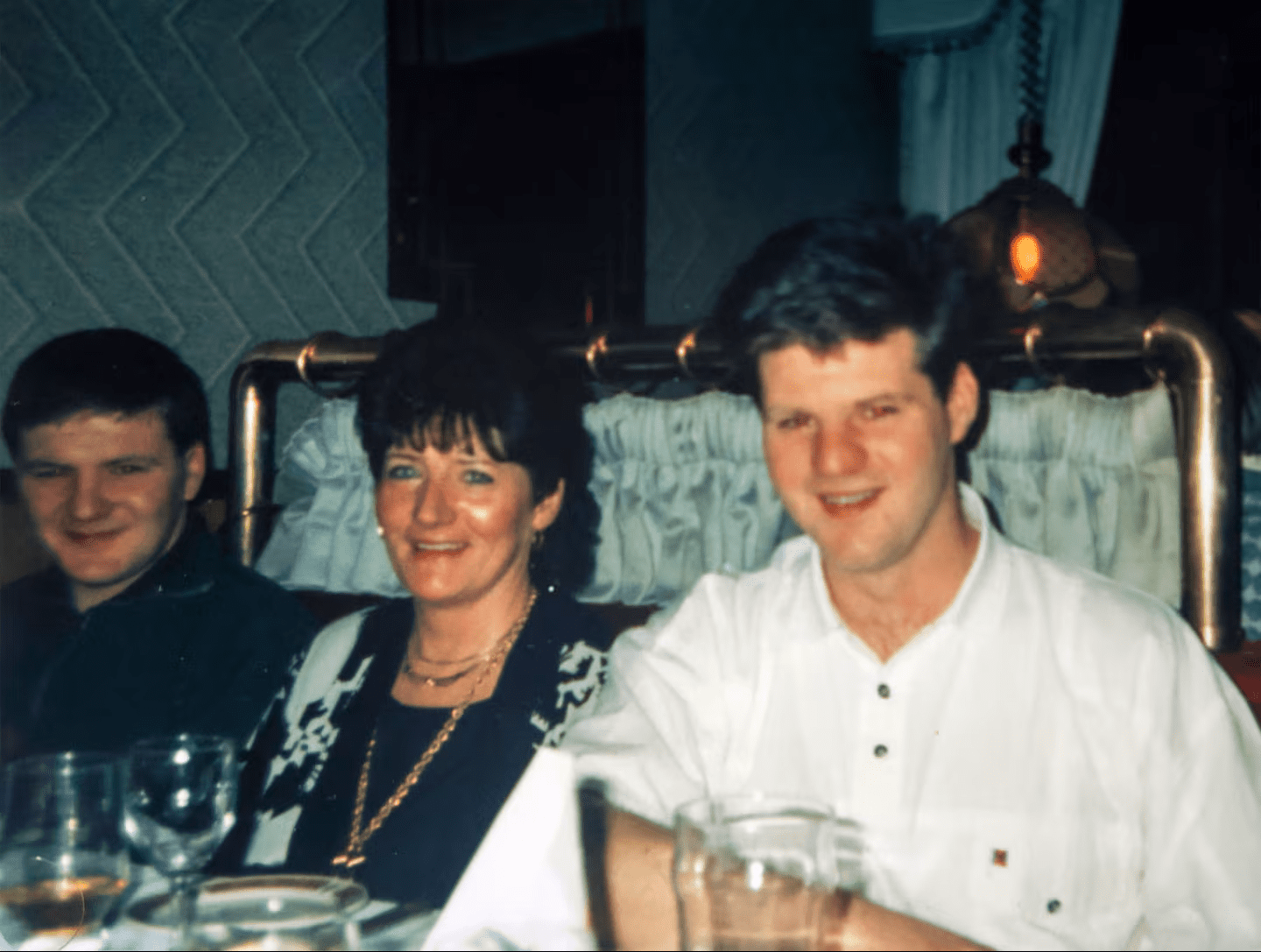 Eugene, right, with mum Margaret and brother Paul