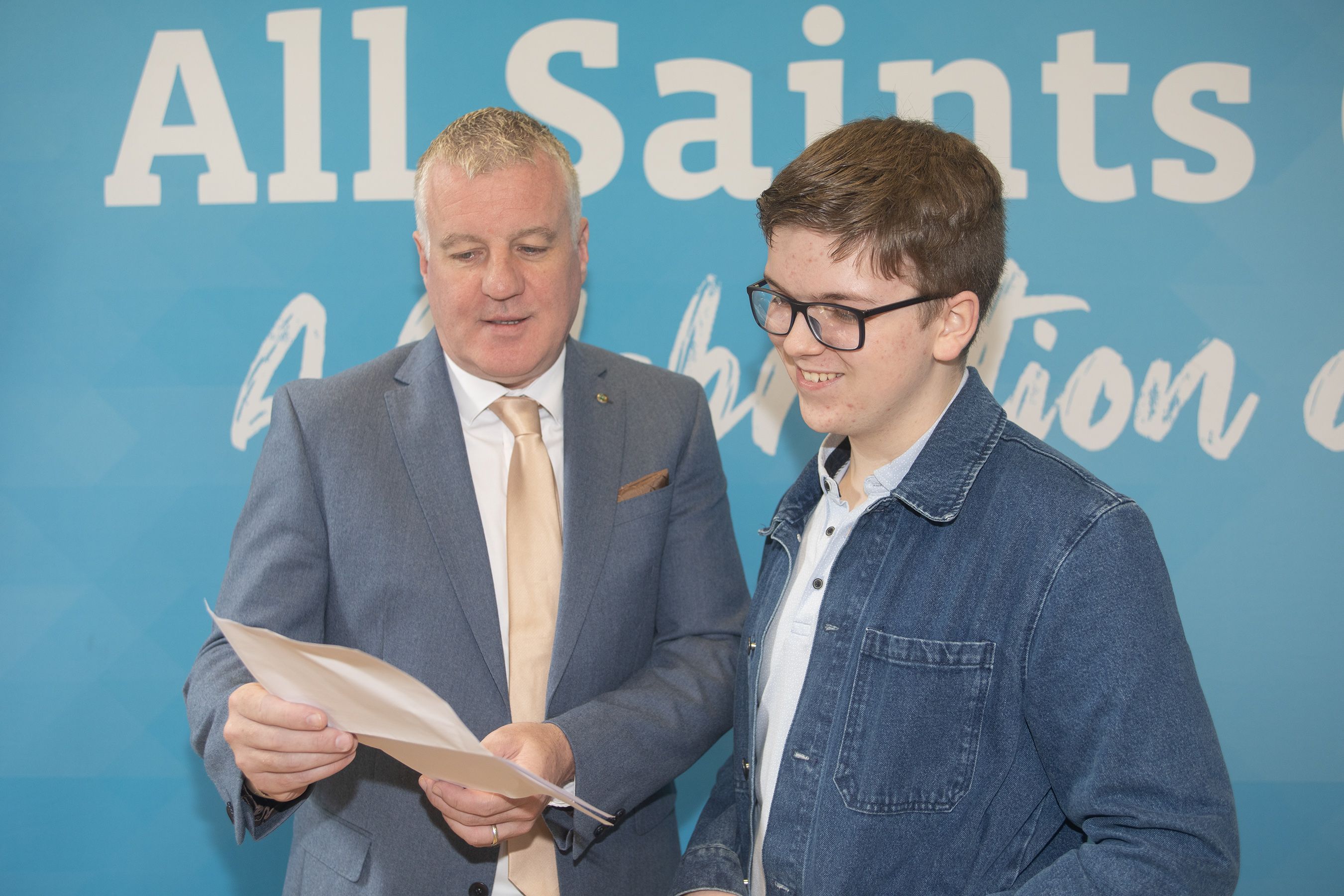 All Saints Principal Damien Coyle with pupil Ethan O'Rourke this morning
