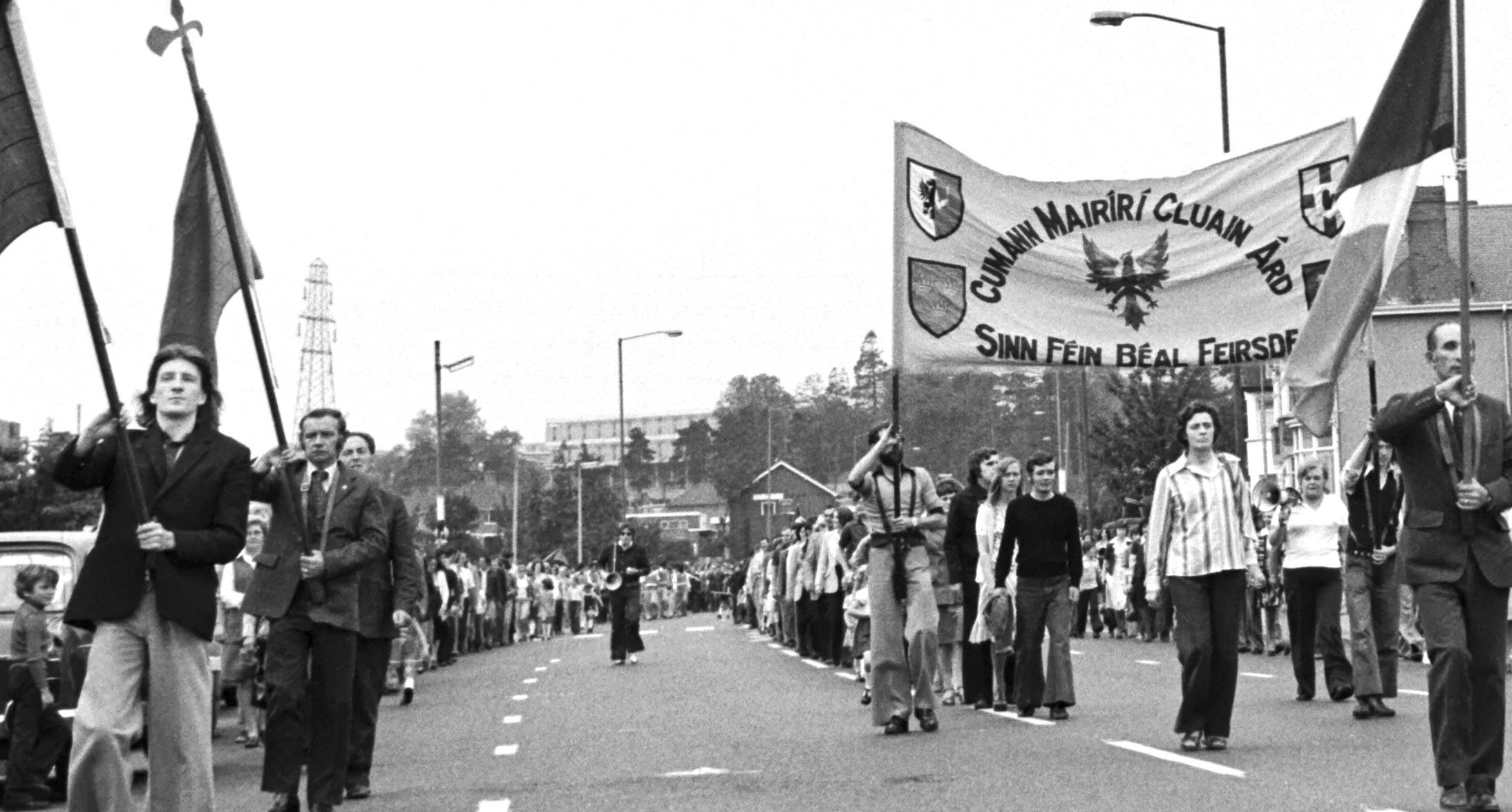 The photo of Bobby Sands, left, and Máire Drumm, second right, taking part in the first march in support of political status in August 1976