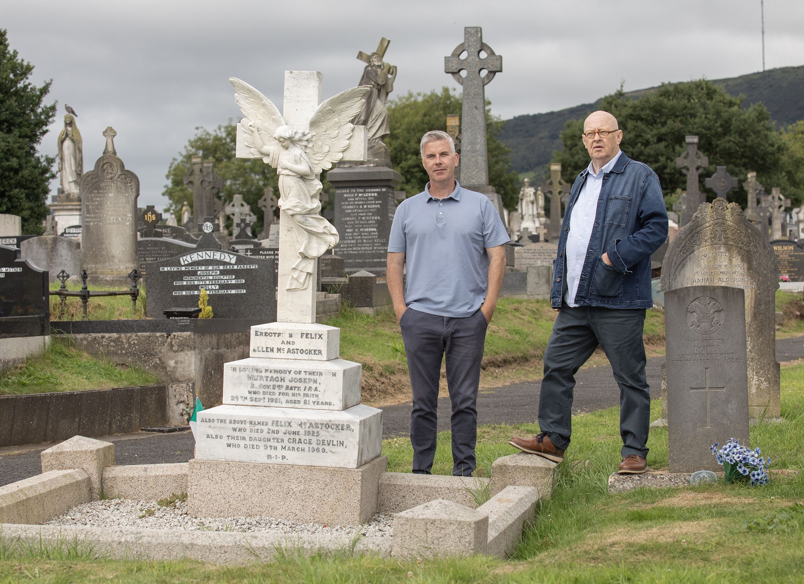 Steven Corr and Joe Austin at the grave of Murtagh McAstocker