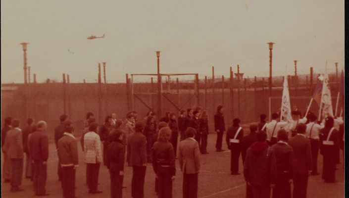 Photograph of drilling and marching during Easter Commemoration 1976, Cage 10, Long Kesh, with British Army helicopter flying overhead. All images from Paddy McMenamin Archive, University of Galway Library. Also some of the journals that were published in Long Kesh