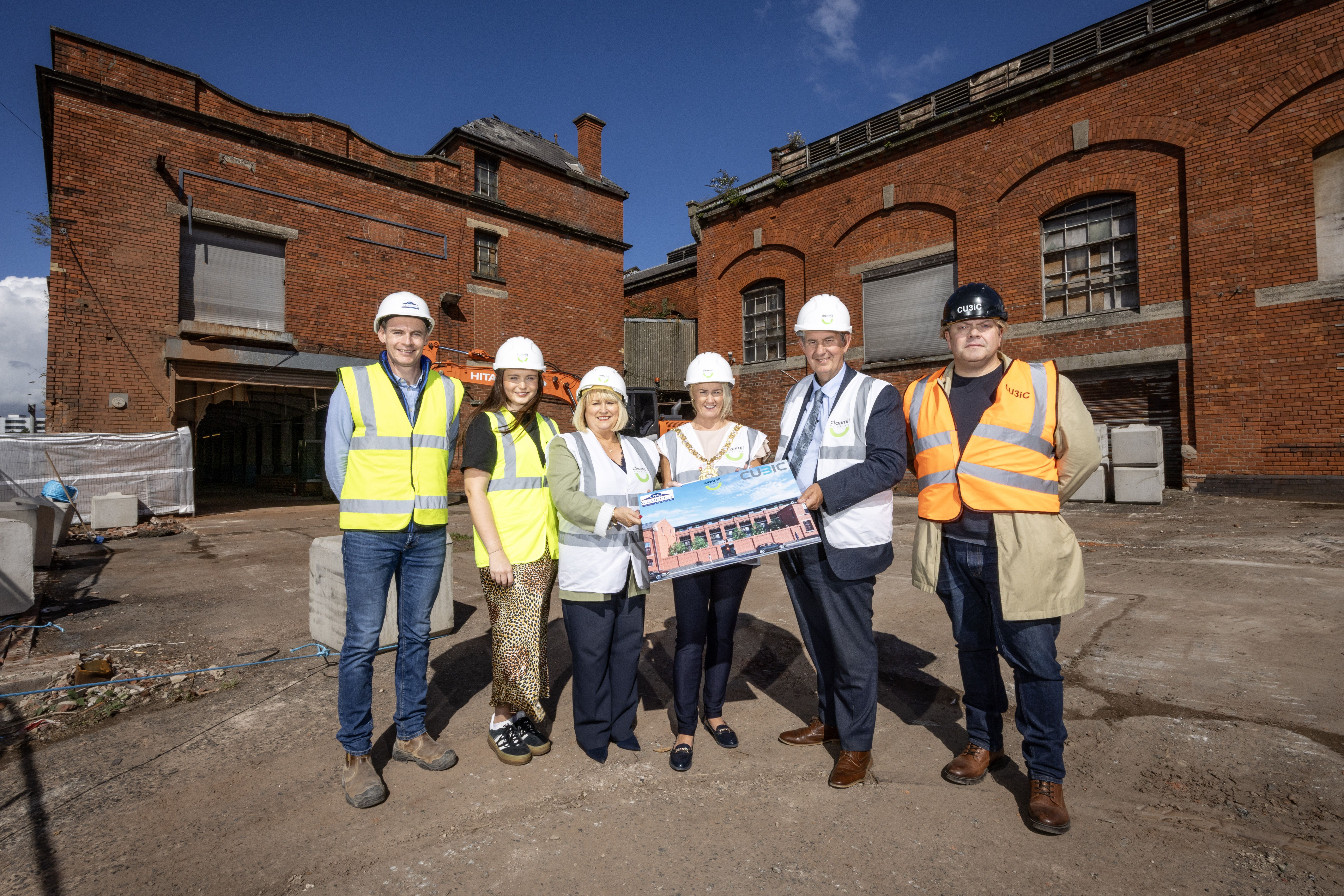 Padraig McKaigue of P&K McKaigue Ltd, Zara Gregg of Greater Village Regeneration Trust, Carol McTaggart, Clanmil Housing CEO, Lord Mayor Councillor Tracy Kelly, Edwin Poots MLA and Roger Alexander of Cubic3 Ltd.