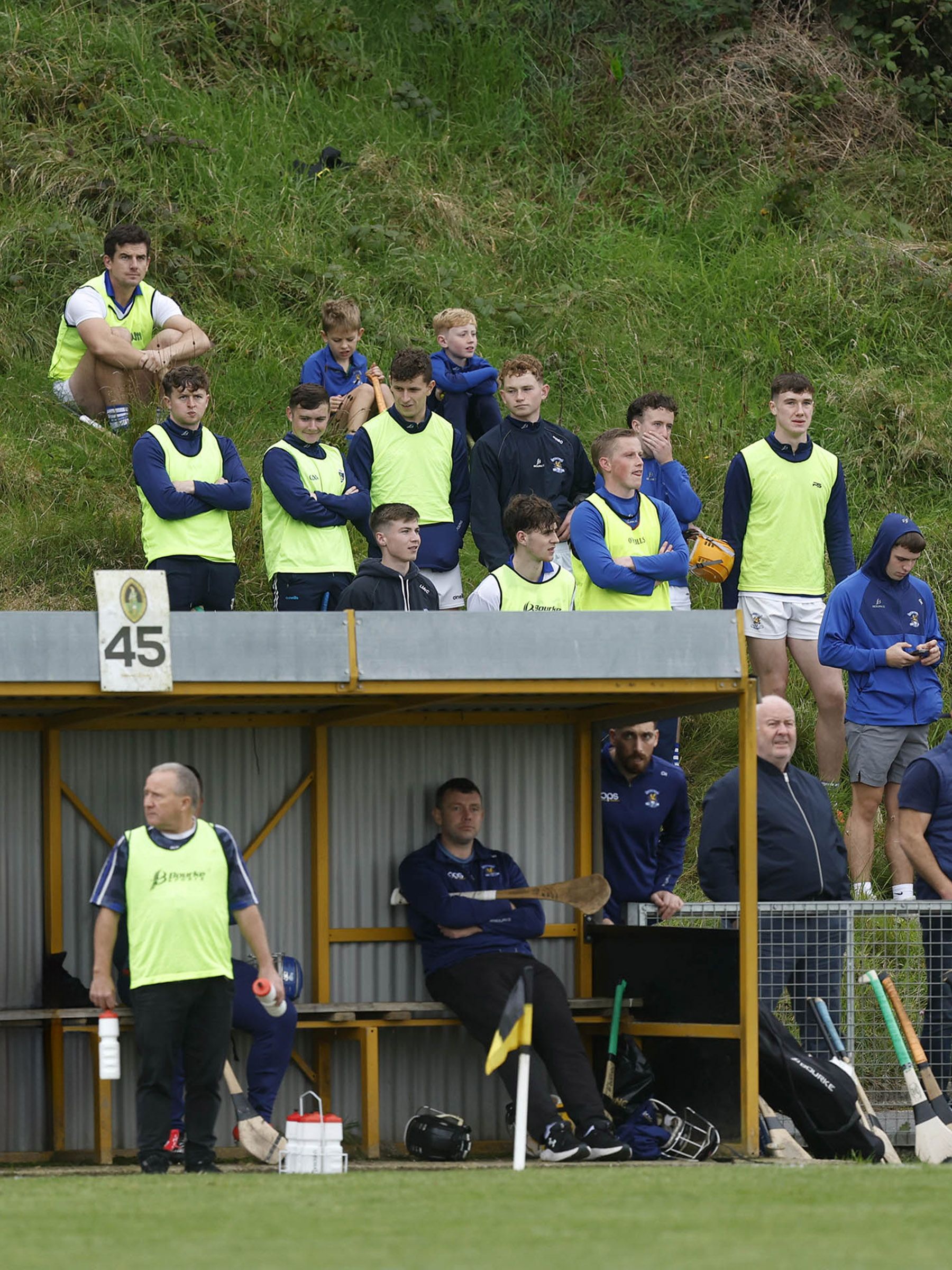 The Johnnies bench looked on as time ran close