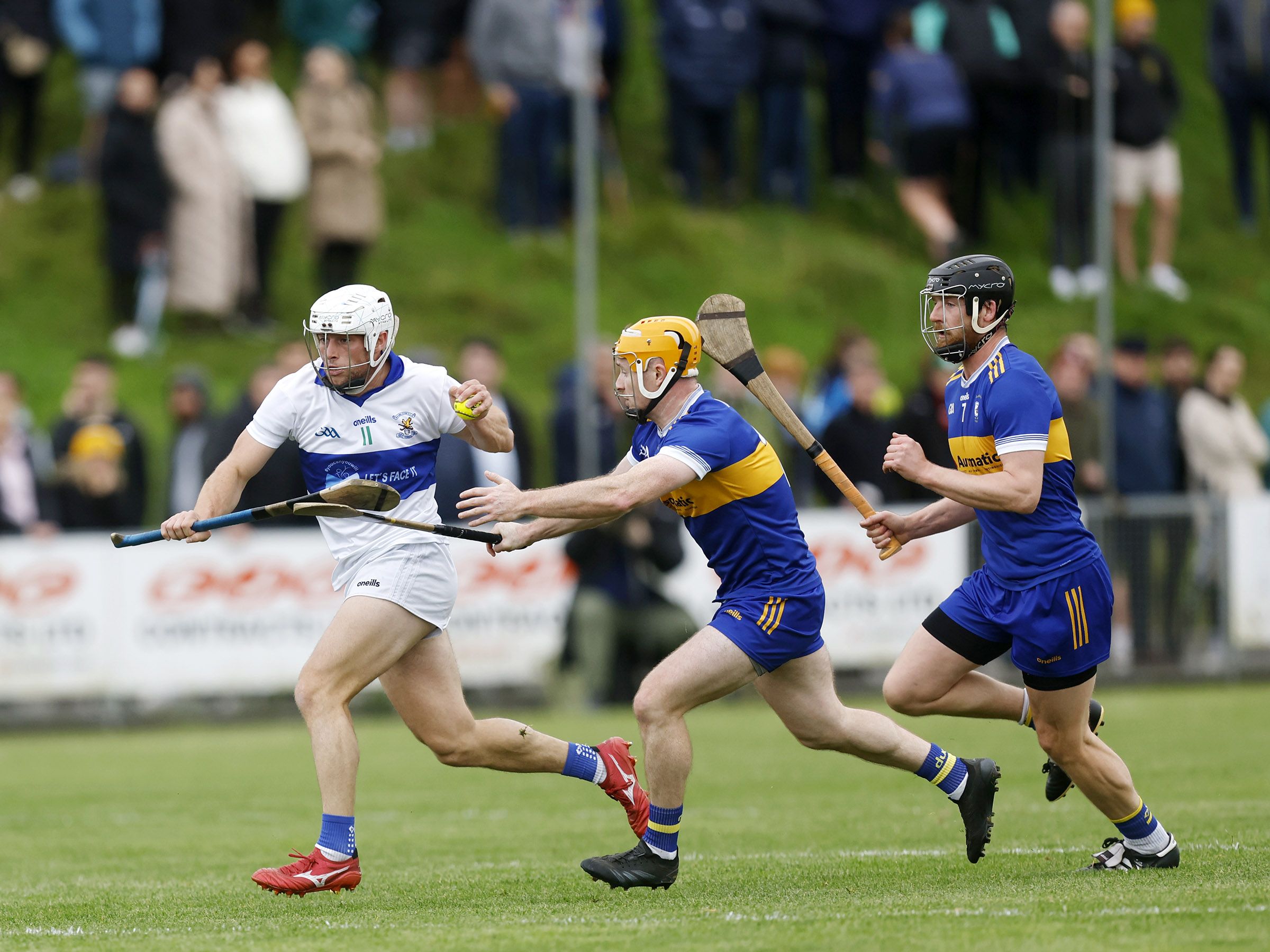 Conor Johnston evades the Rossa defence