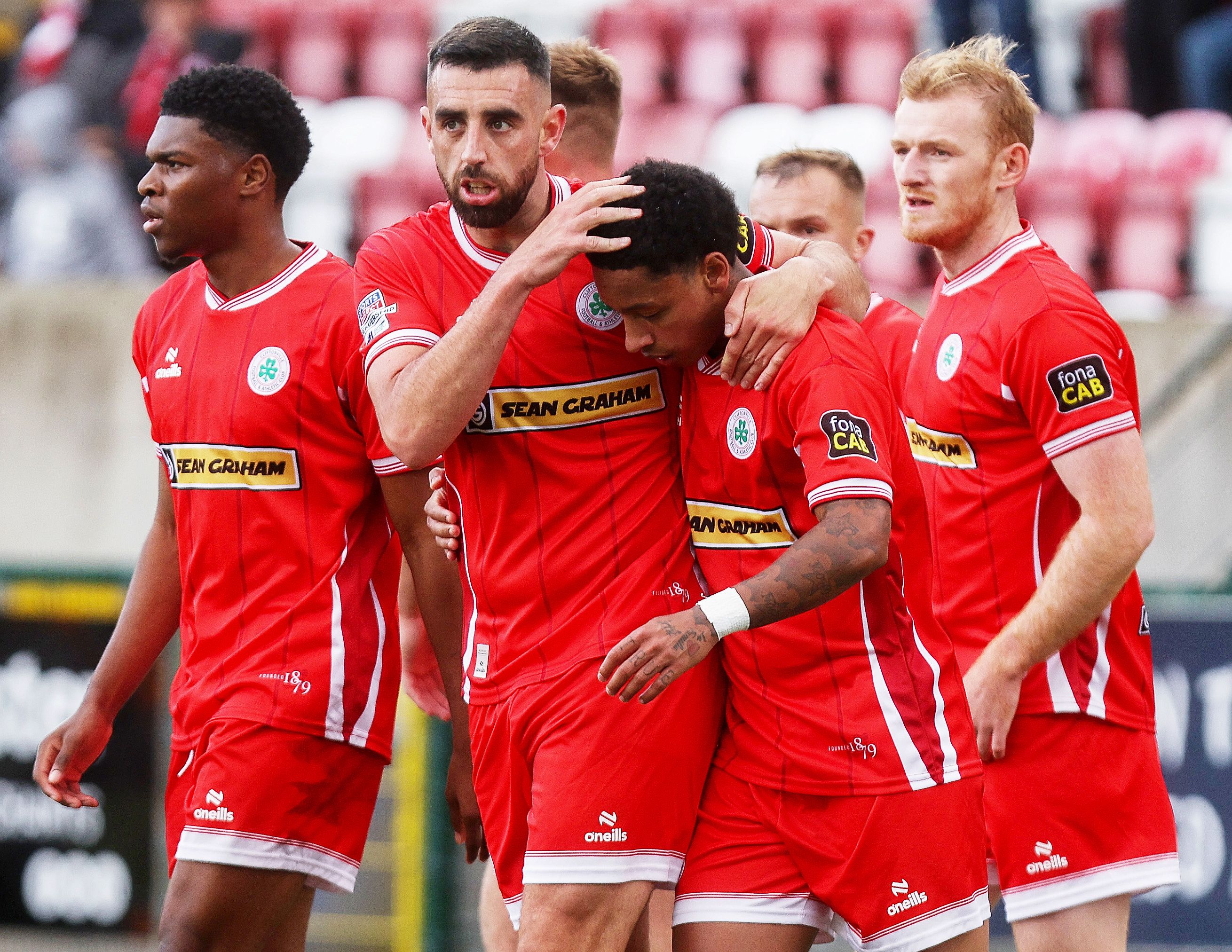 Joe Gormley celebrates with Sean Robertson after he put the Reds 2-1 to the good