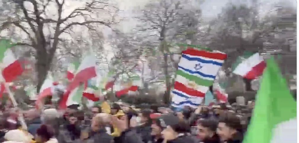 SAY WHAT? Demos by Iranian exiles have been marked by the odd popularity of Israel flags