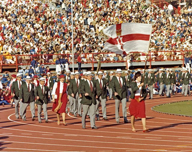 SAME OLD SAME OLD: The NI team with the Ulster flag at the 1982 Commonwealth Games in Brisbane (pic Queensland State Archives)