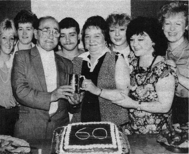 HAPPY BIRTHDAY: Joe Mooney was the guest of honour at a surprise party to celebrate his 60th birthday In the Tullymore CC back in October 1985. Joe took a long time reading this birthday card with the names of all his family, in-laws and grandchildren