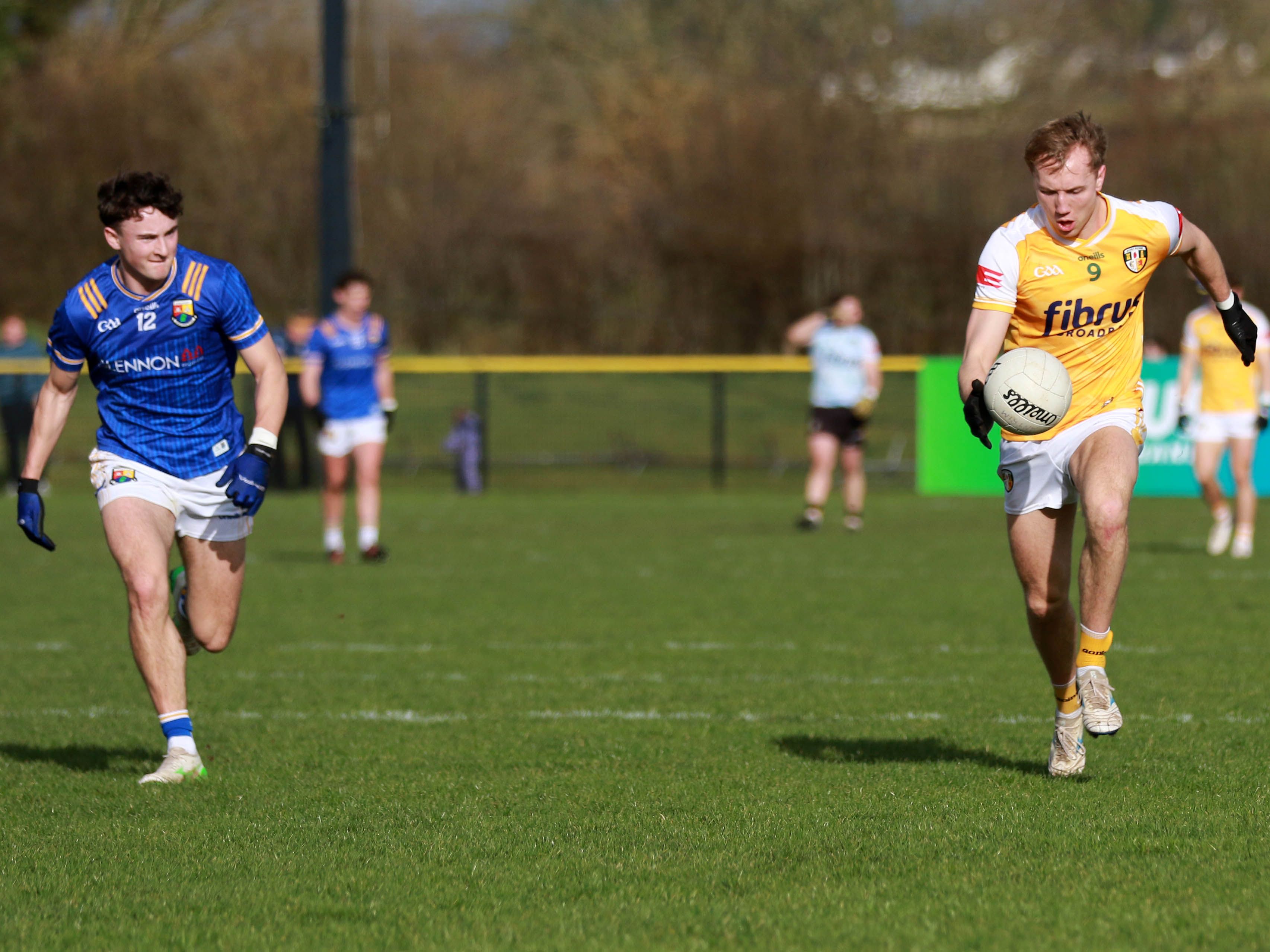 Cathal Hynds carries the ball for Antrim