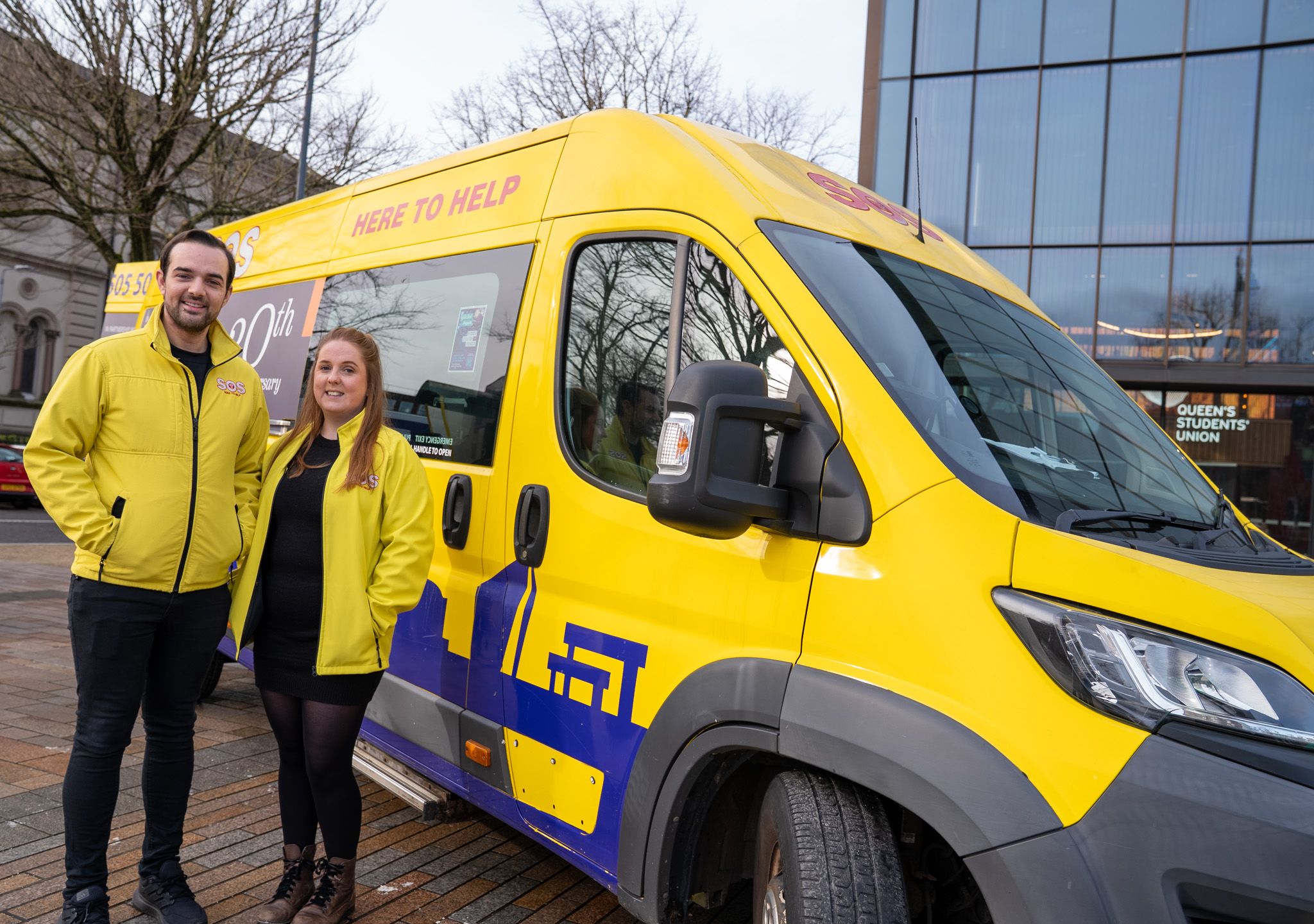 Caitlin McCartney, Operations & Stakeholder Manager of SOS Bus NI and Micky Murray, its CEO, are pictured at Queen's.