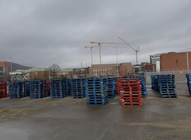 Bonfire pallets with an electricity substation, the M1 and the RVH in the background