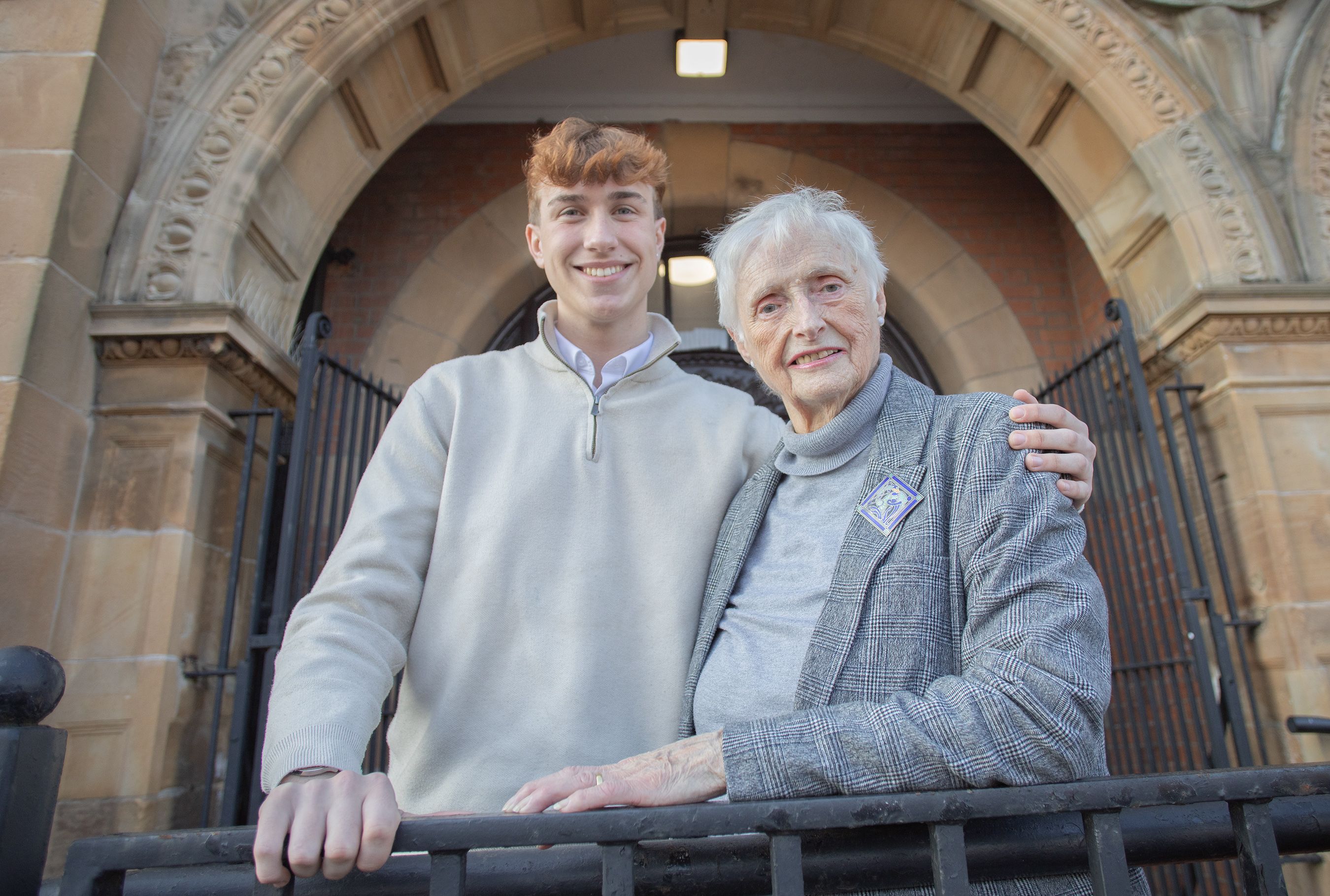 Shay Fox with former Alliance Party deputy leader Eileen Bell on the Falls Road