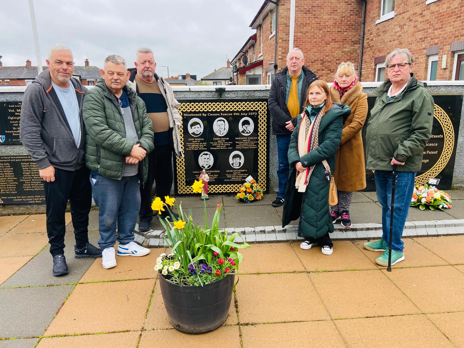 HOPE FOR JUSTICE: Relatives of those who were shot dead by the British Army in the Springhill and Westrock Massacre in July 1972 at the Memorial Garden dedicated to their loved ones