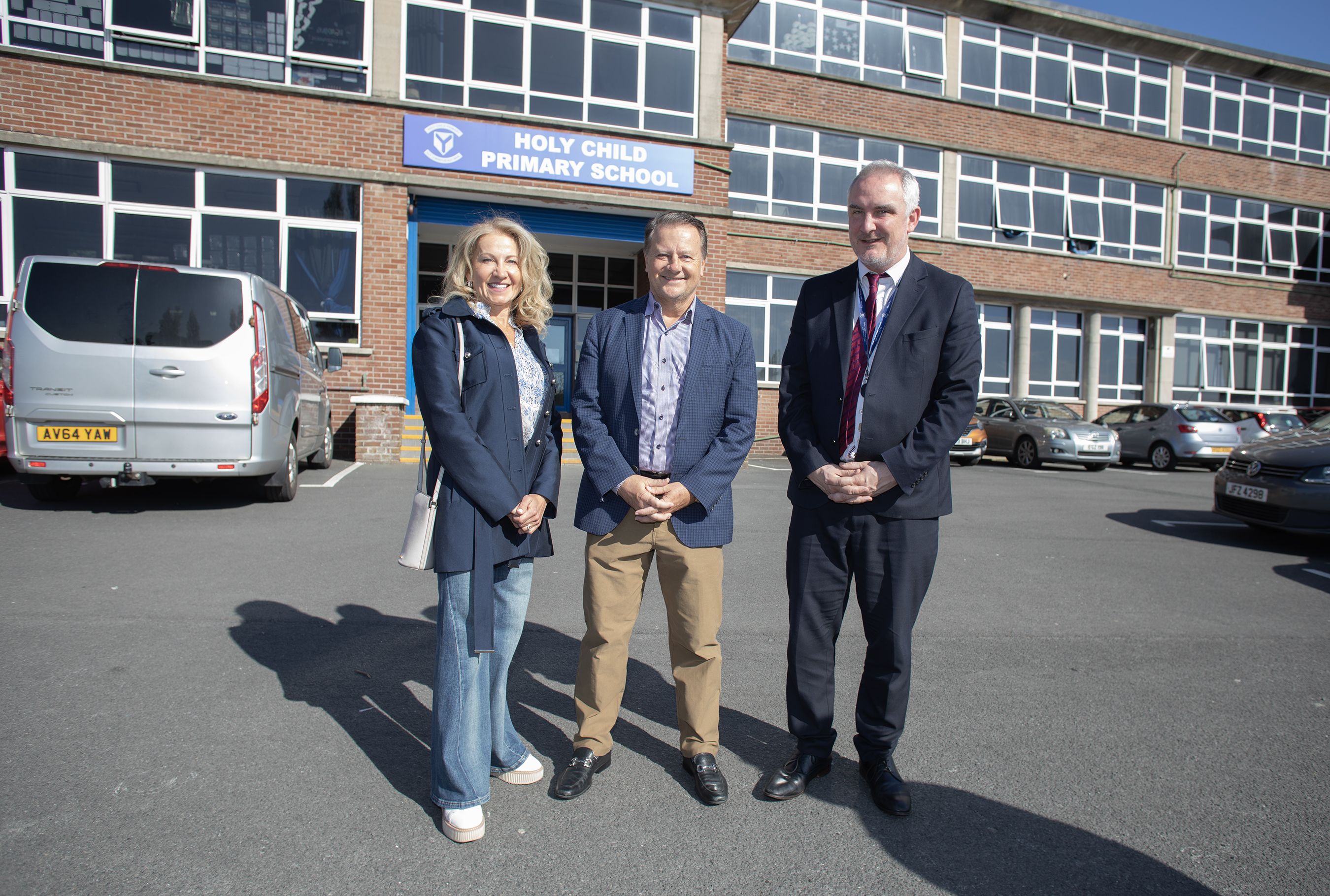 Mark Purdy with wife Emma and Holy Child PS Principal Conor Murphy
