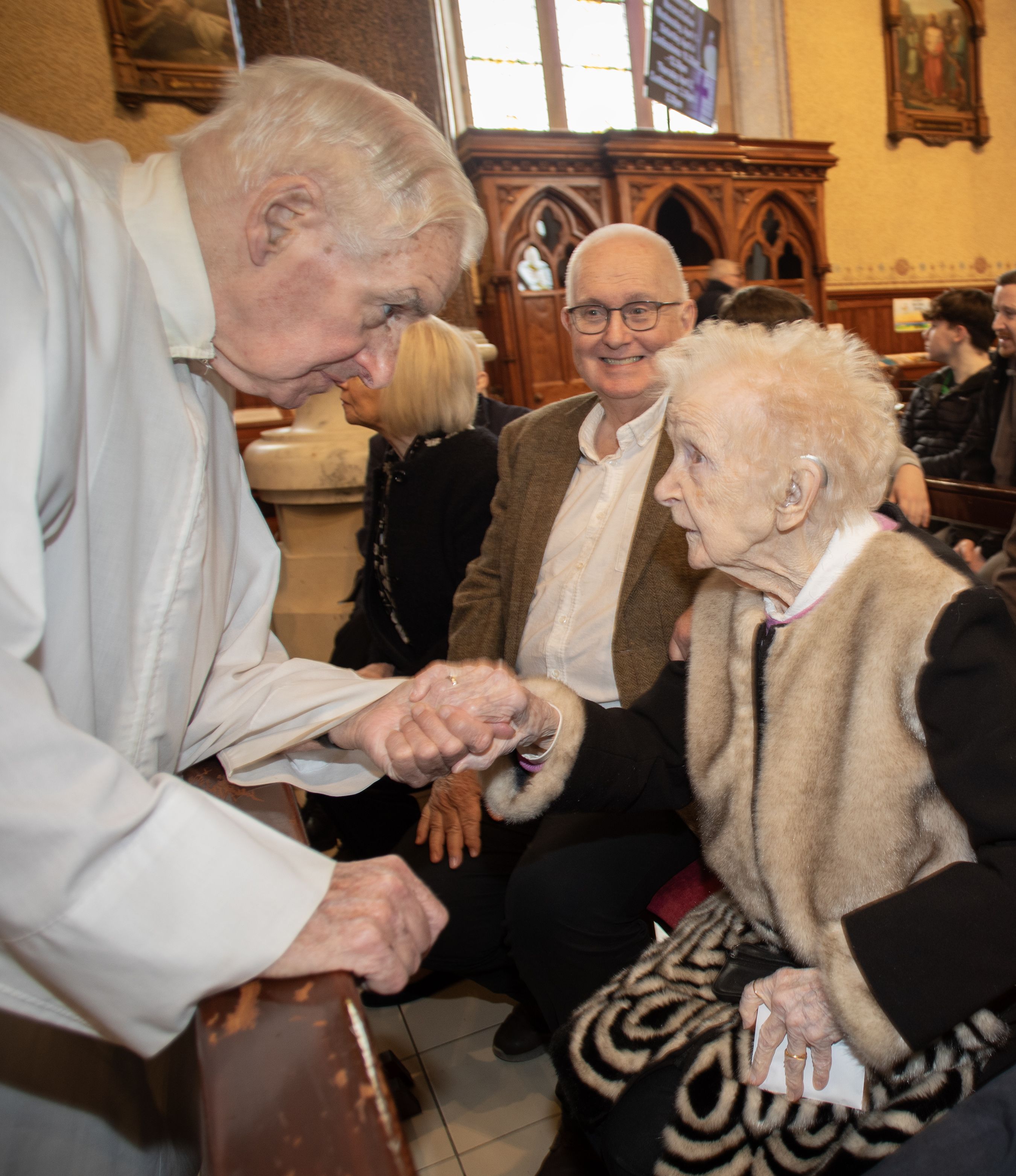 Una is greeted by Fr Willie McGettrick