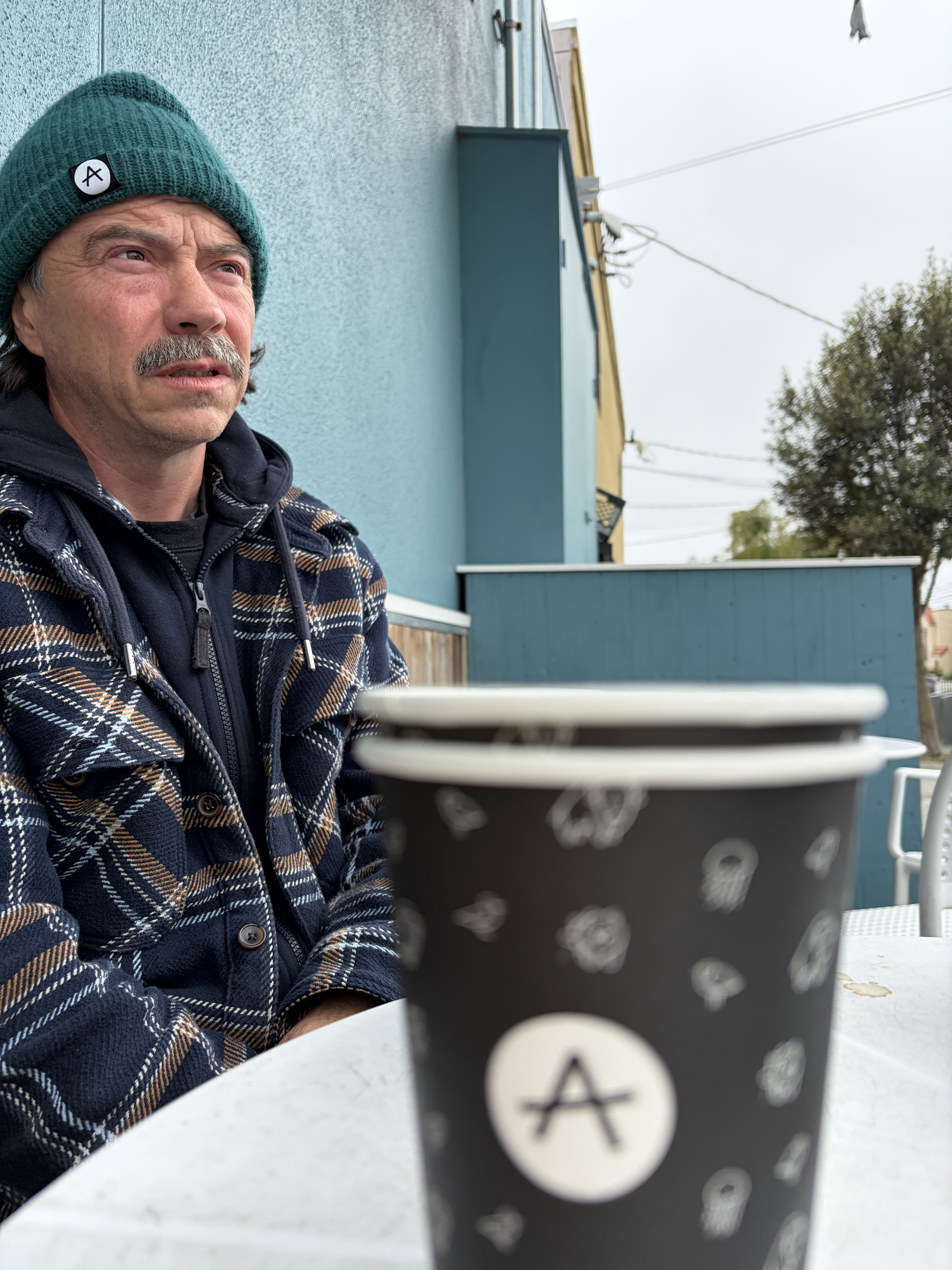CORNER OF A FOREIGN FIELD THAT IS FOREVER WEST BELFAST: Mickey McCrory, who founded Andytown with his wife Lauren, at the Outer Sunset branch of his coffee house chain