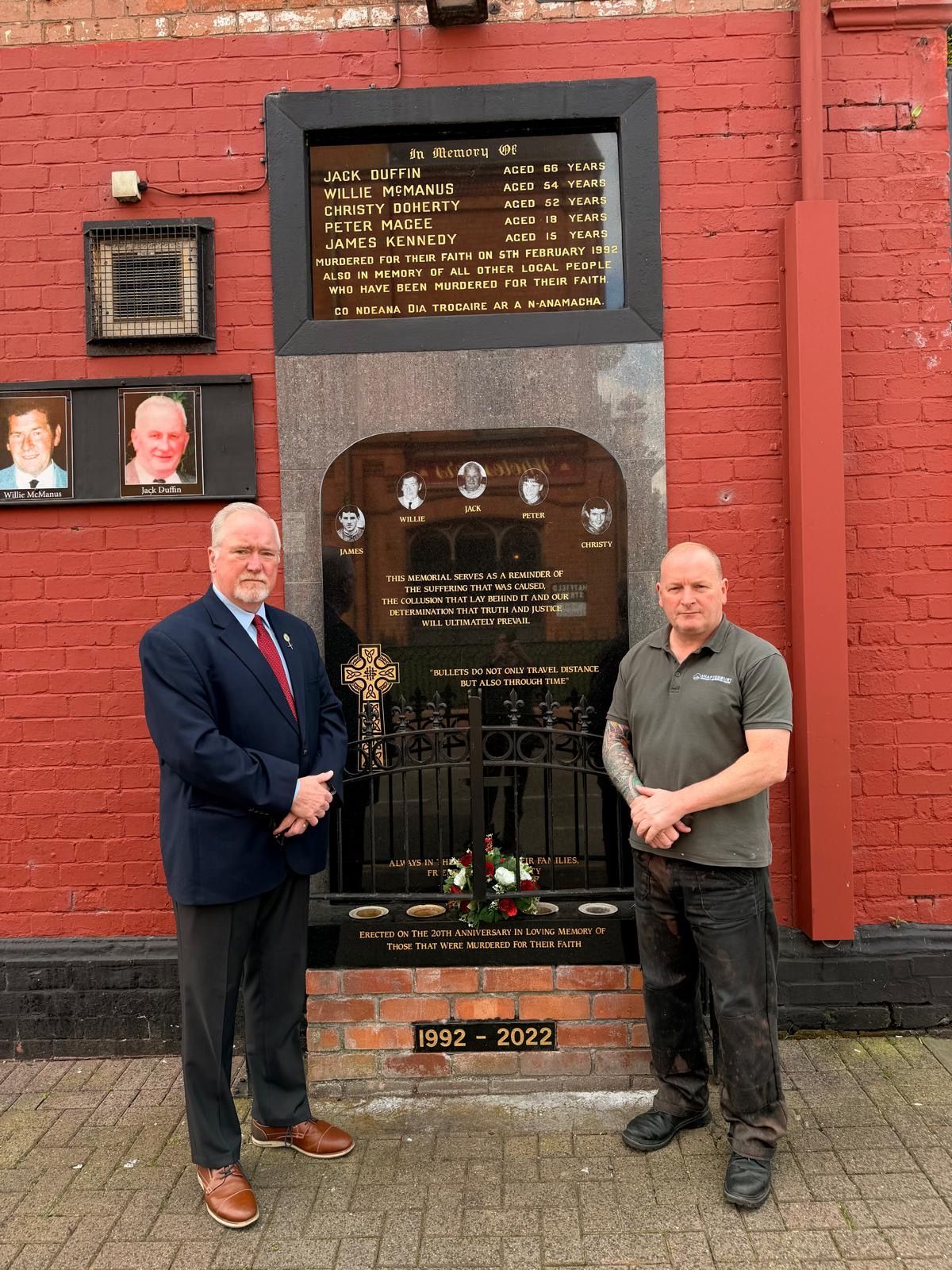 Sean Pender with Billy McManus, whose father Willie was murdered in Sean Grahams, at the memorial to the five victims