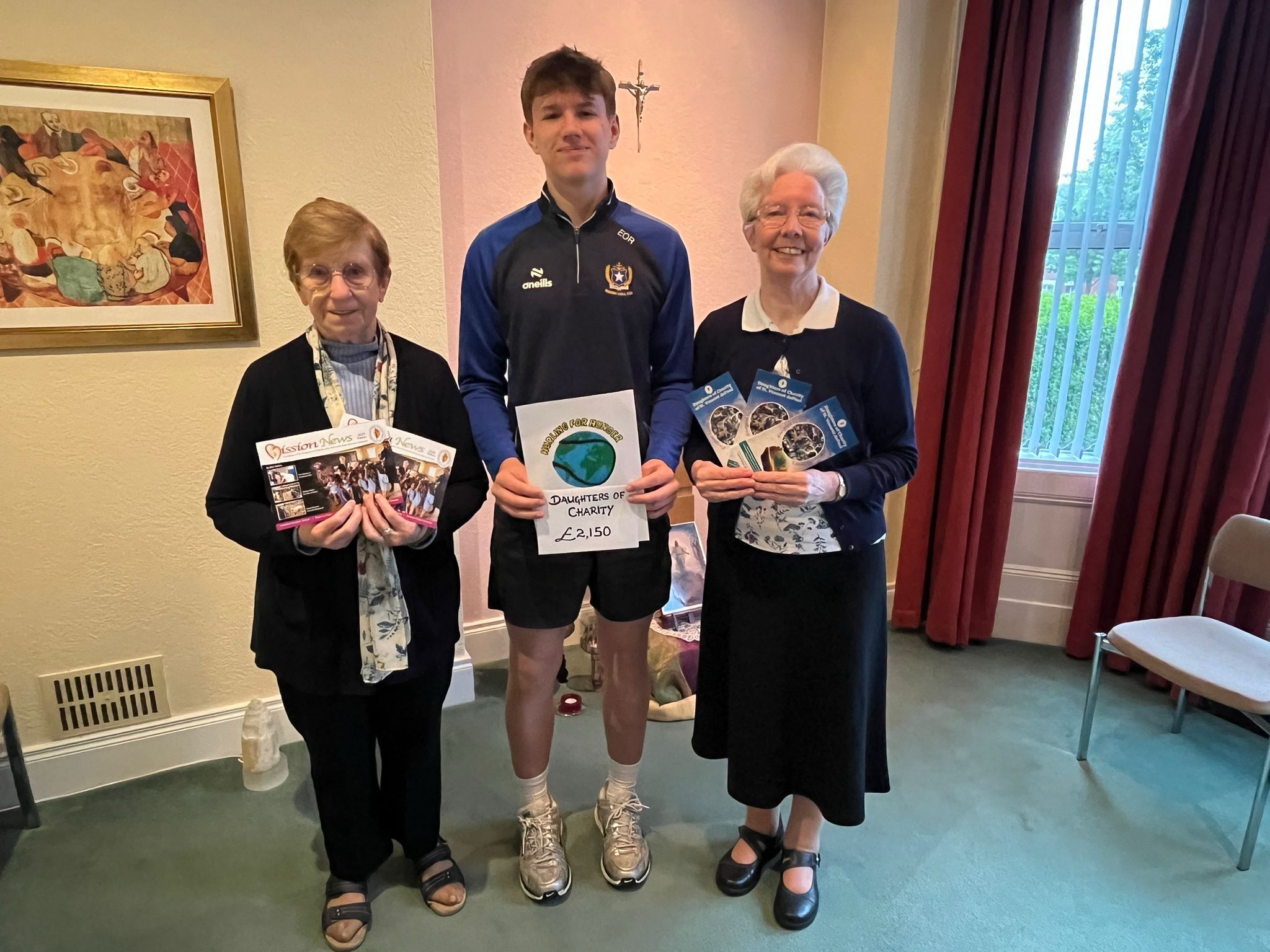 Sister Nuala and Sister Kathleen with Ethan O'Rawe of Naomh Gall