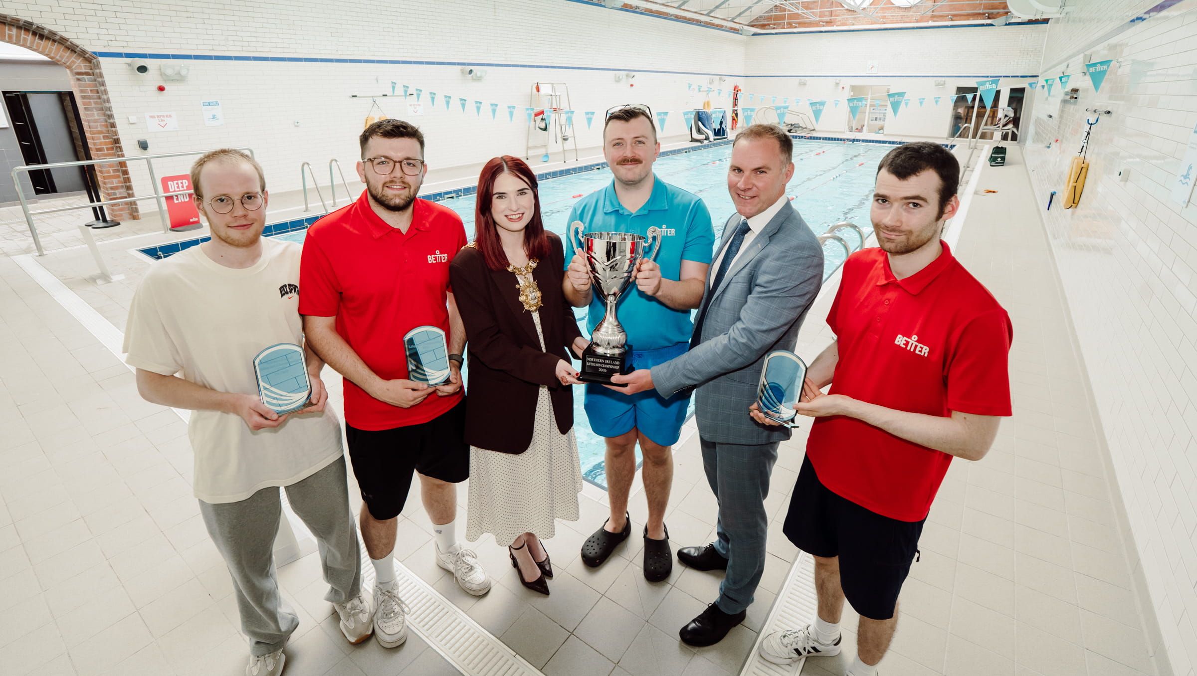 Members of the first-placed Lisnasharragh team with the Lord Mayor and Gareth Kirk. (L-R): Séamus Carroll; John Jeffery; Lord Mayor of Belfast, Cllr Róis-Máire Donnelly; Daniel Stafford; Gareth Kirk; and Ethan McAllister