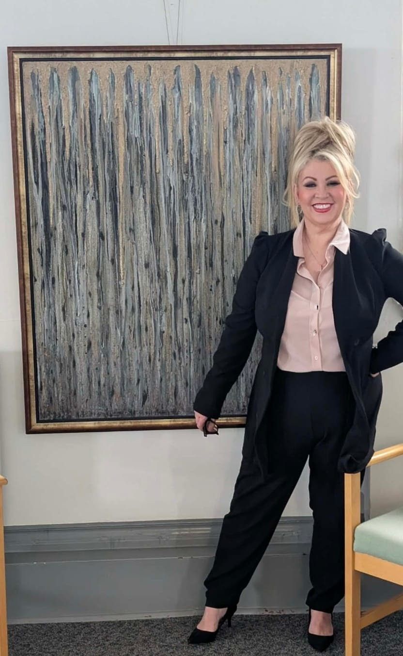 Margaret with one of her pieces of art