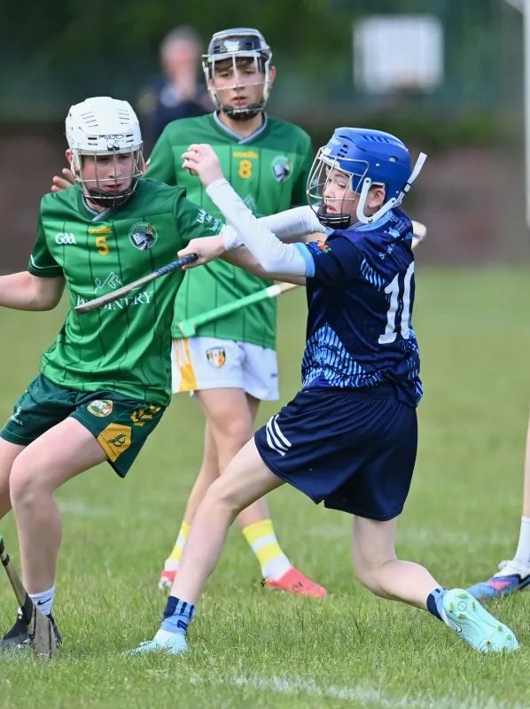 A BELFAST BATTLE: Both clubs battled hard for their schools last Wednesday