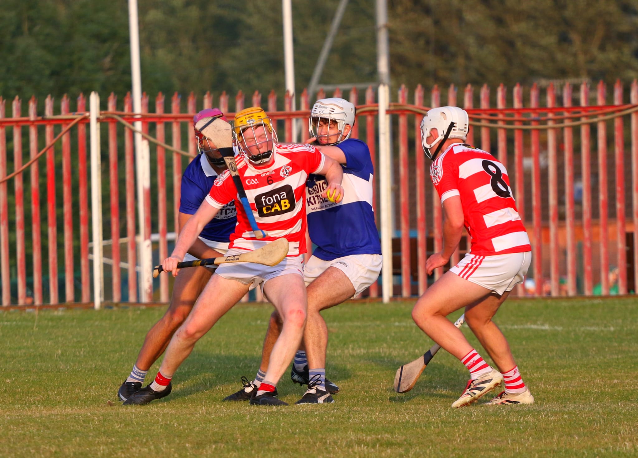 BELFAST CLASH: Both sides battled hard but St John's prevailed