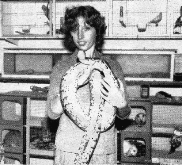 BRAVE WOMAN: Lorraine Allen with Sid the snake at Martin’s Pet and Garden Centre in Andersonstown