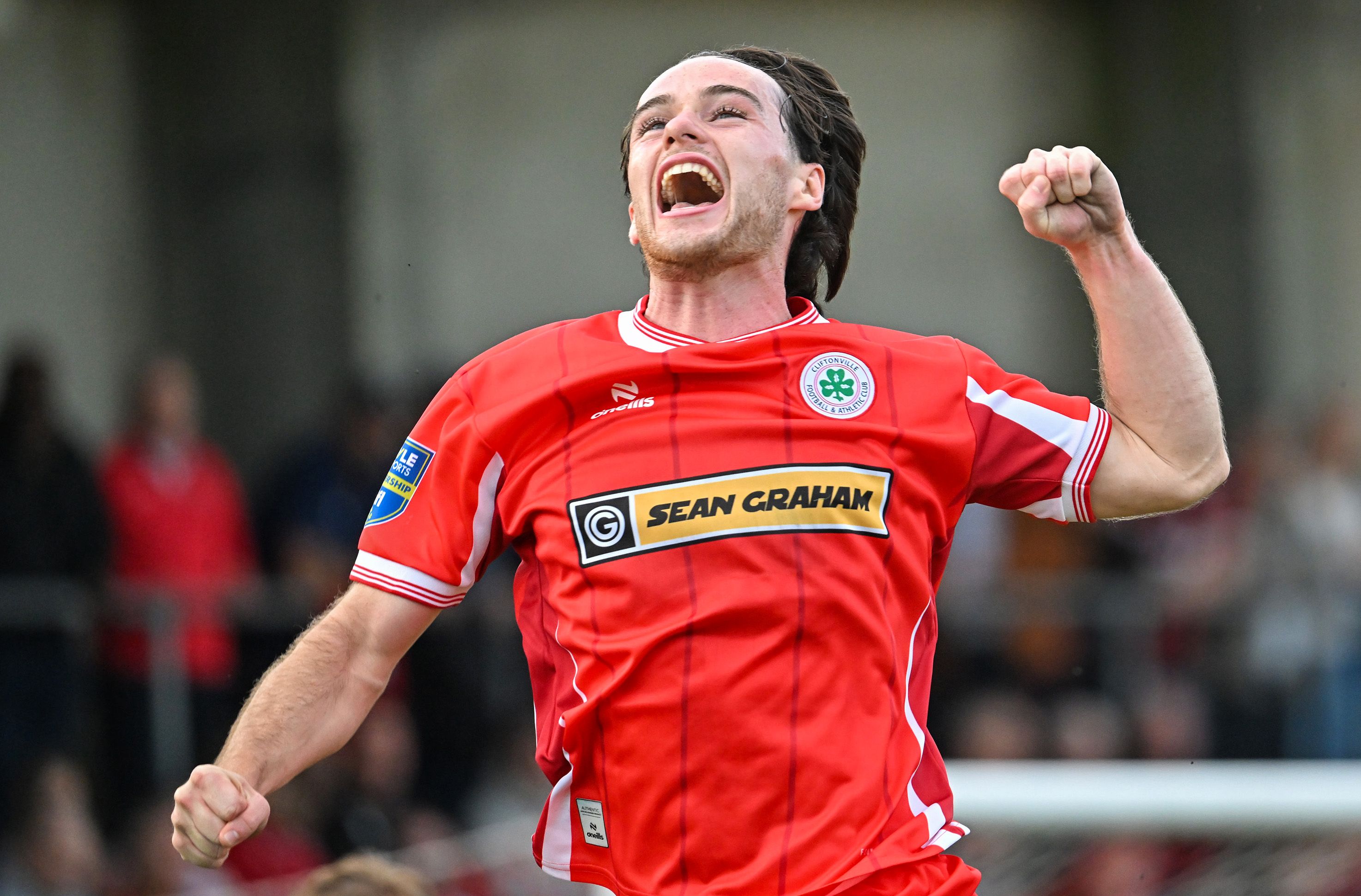 Ben Quinn celebrates scoring the opener for Cliftonville