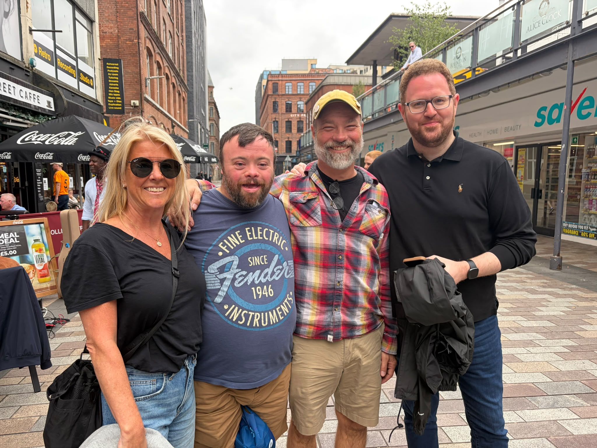 STAR POWER: Oscar-winner James Martin (from An Irish Goodbye) takes a break from playing with a trad band to welcome American visitors Kelly Hemple, Brian Rainville and Will Petty of the Teamsters International union in the US