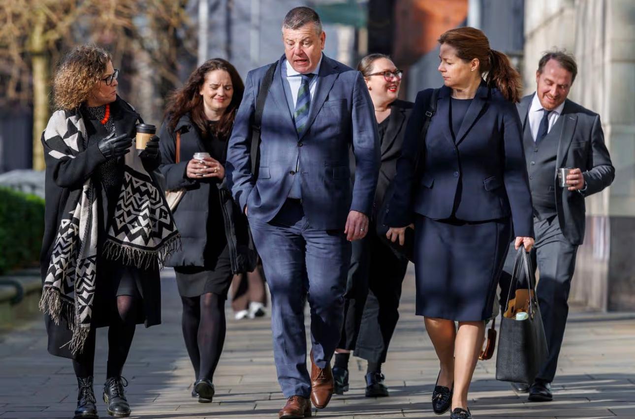 Solicitor Niall Murphy, centre, Fiona Donohoe, left