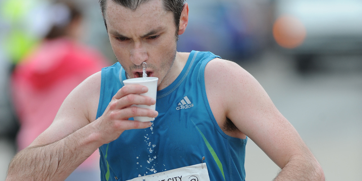 Marathon runners struggle to drink from plastic cups