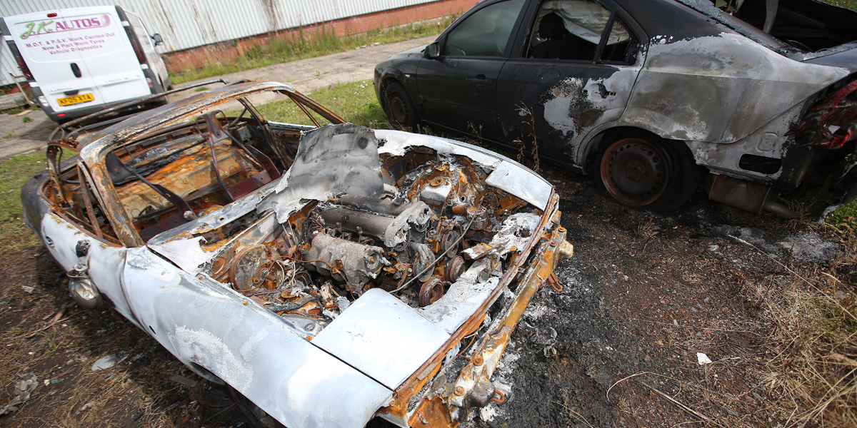 Two of the four vehicles burnt in loyalist attacks at the weekend