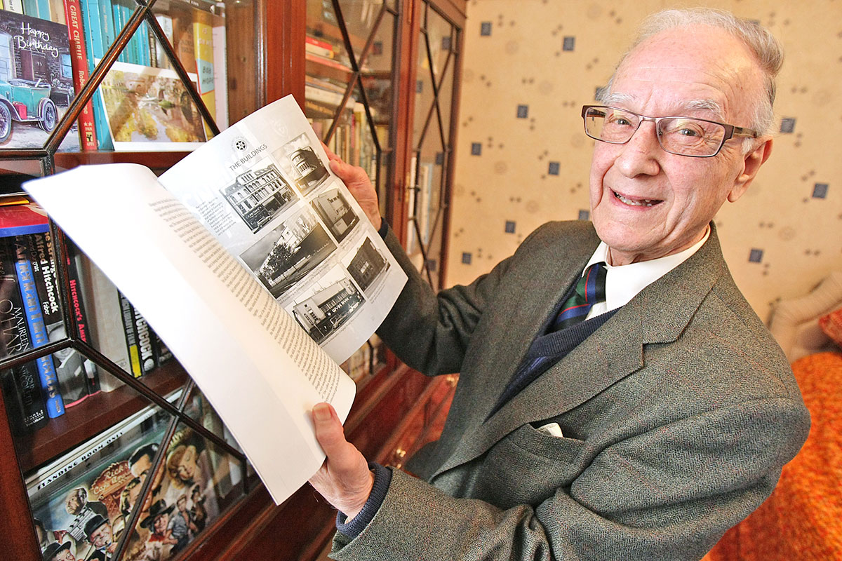 Tom Hughes with his new book