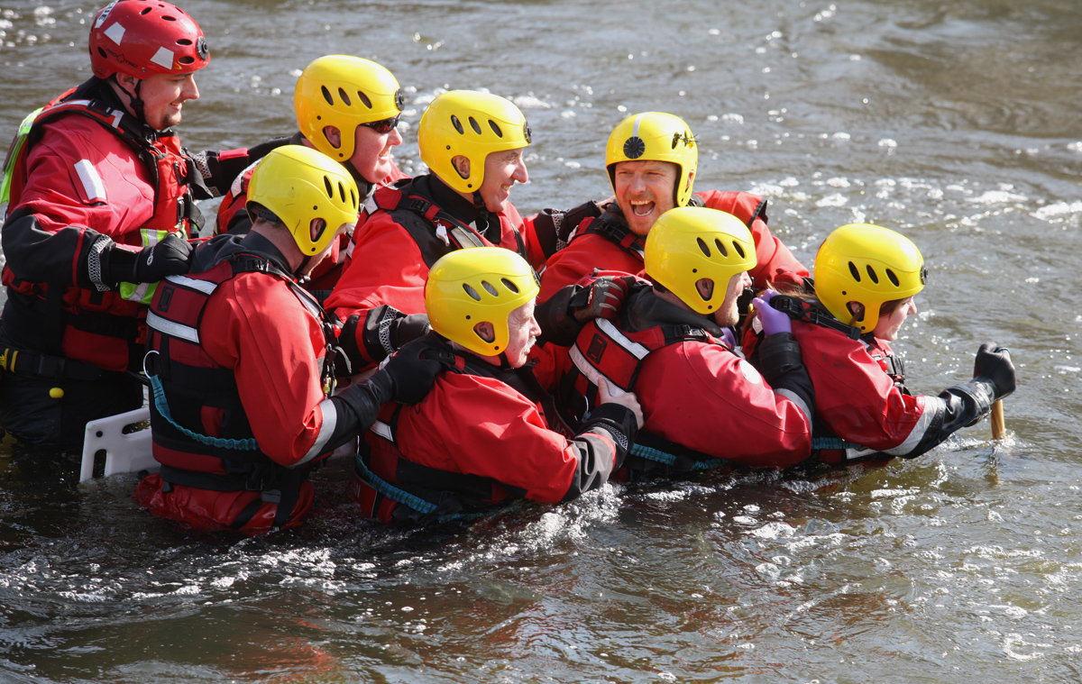  Máirtín Ó Muilleoir and Sammy Douglas in the safe hands of the river rescue team