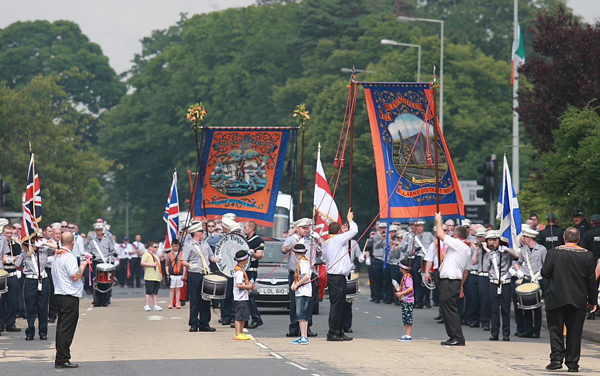 The July 12 parade in Glengormley in 2013 passing through the part of Glengormley from which a new Orange parade has been diverted 