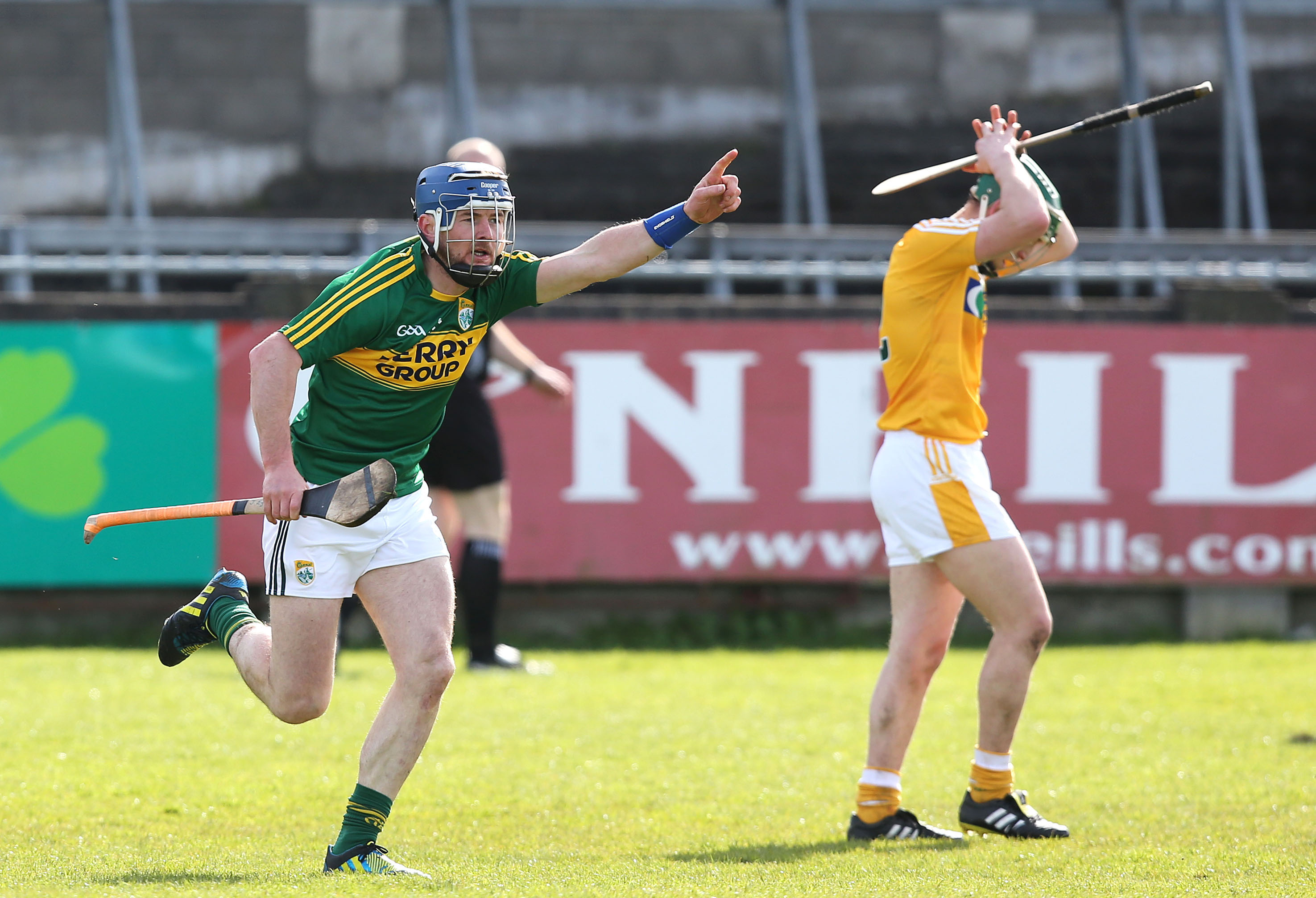 John Egan wheels away in triumph after his late point condemned Antrim to life in Division 2A
