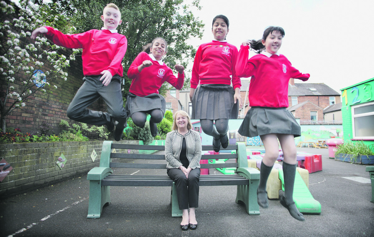 Holy Family pupils jump for joy on hearing that Principal Dina McManus has been nominated for a prestigious Pearson Award