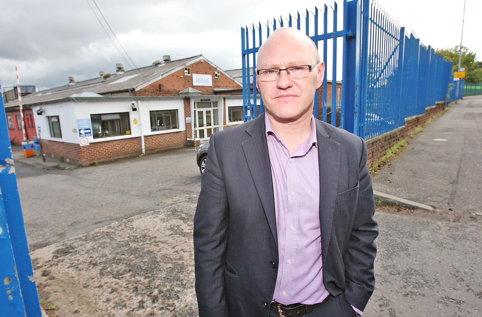 West Belfast MP Paul Maskey at the Initial premises on the Springfield Road, where 24 workers are to lose their jobs