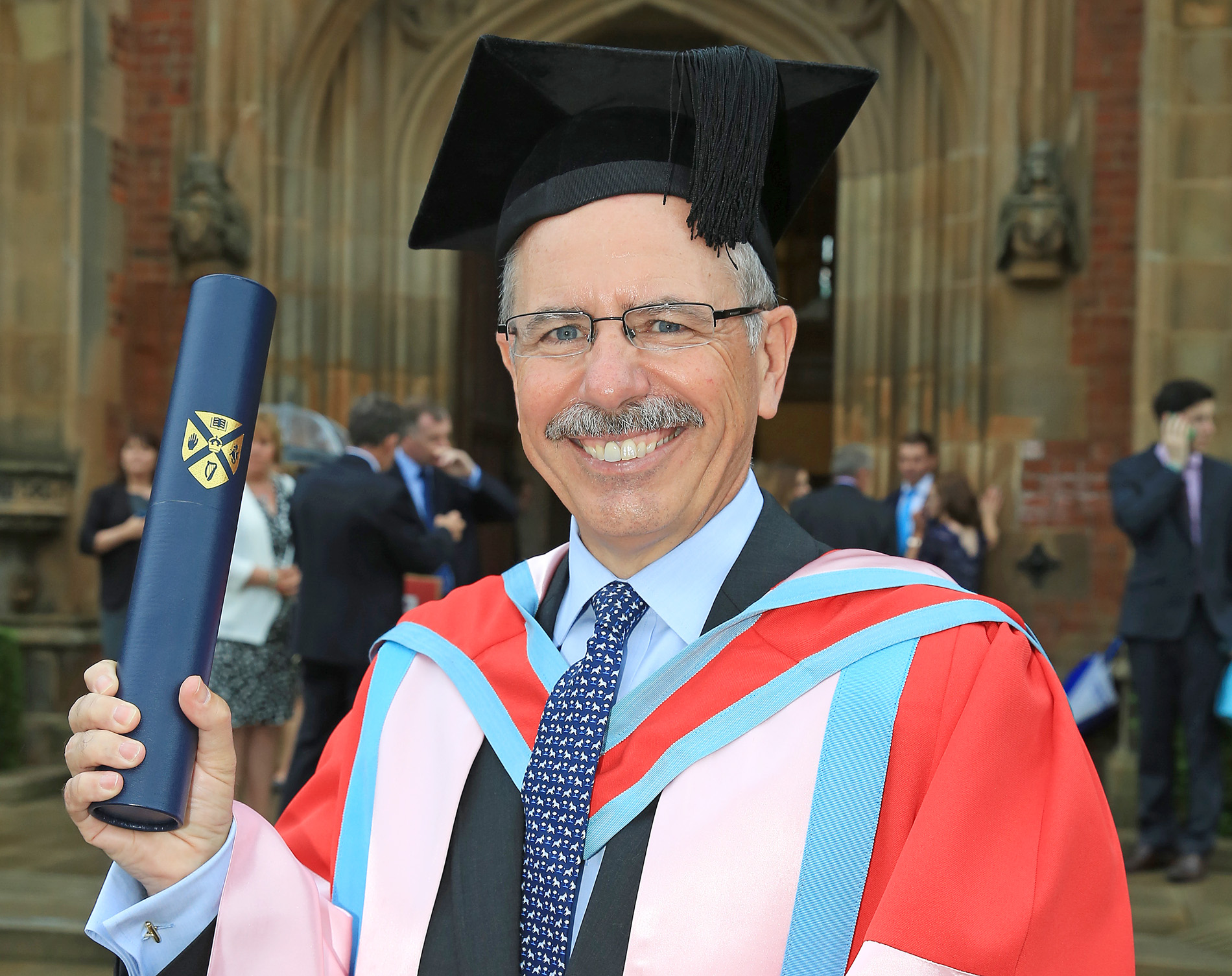 Shaun Kelly shows his delight after receiving his honorary doctorate from Queen’s yesterday