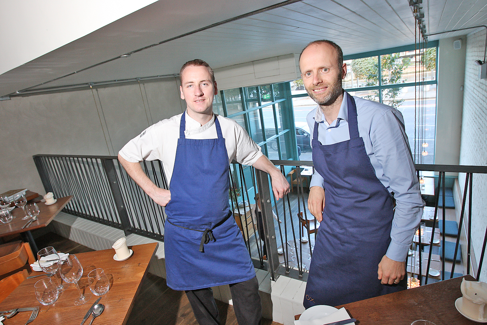 Stephen Toman and Alain Kerloc\'h of restaurant OX celebrate winning a coveted Michelin star