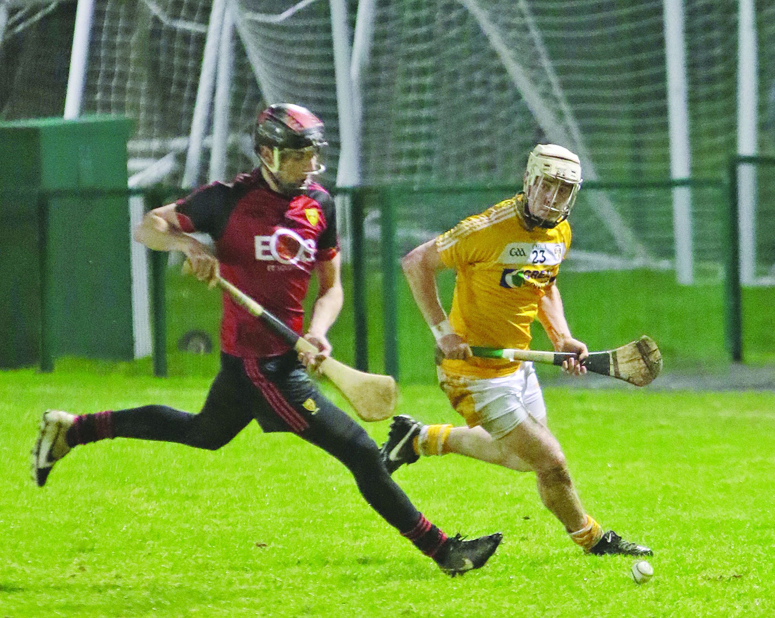 Antrim\'s Conor McGourty and Down\'s James Laverty contest possession during Saturday\'s game at Queen\'s