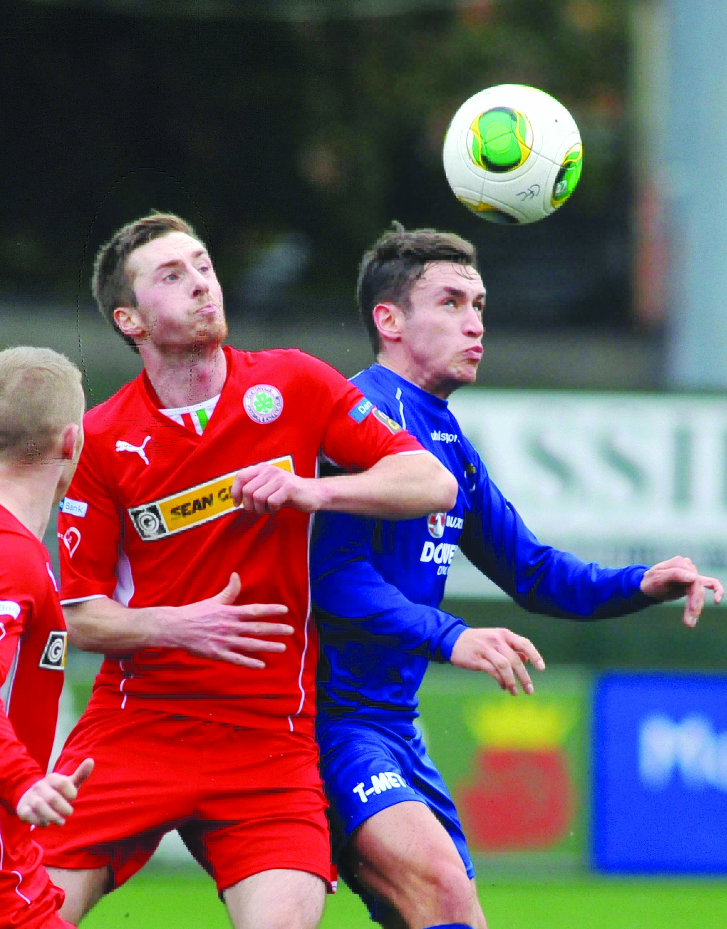 Ciaran Doherty (left), in action for Cliftonville, has signed for Sport and Leisure Swifts and could be in the squad to face Institute