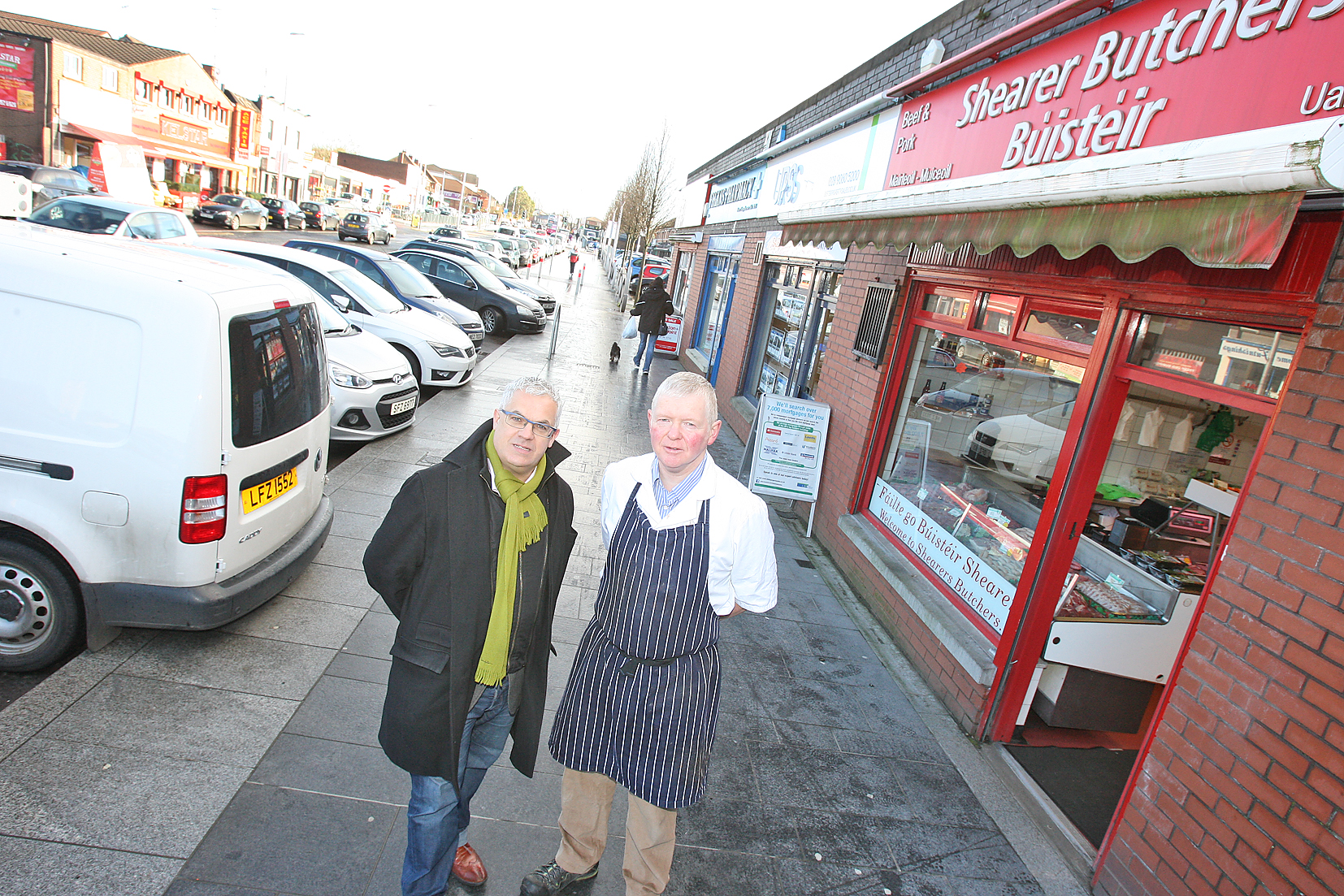 The SDLP’s Councillor Tim Attwood with Fintan Shearer of Shearer’s Butchers, who fears loss of parking space will hit local businesses  